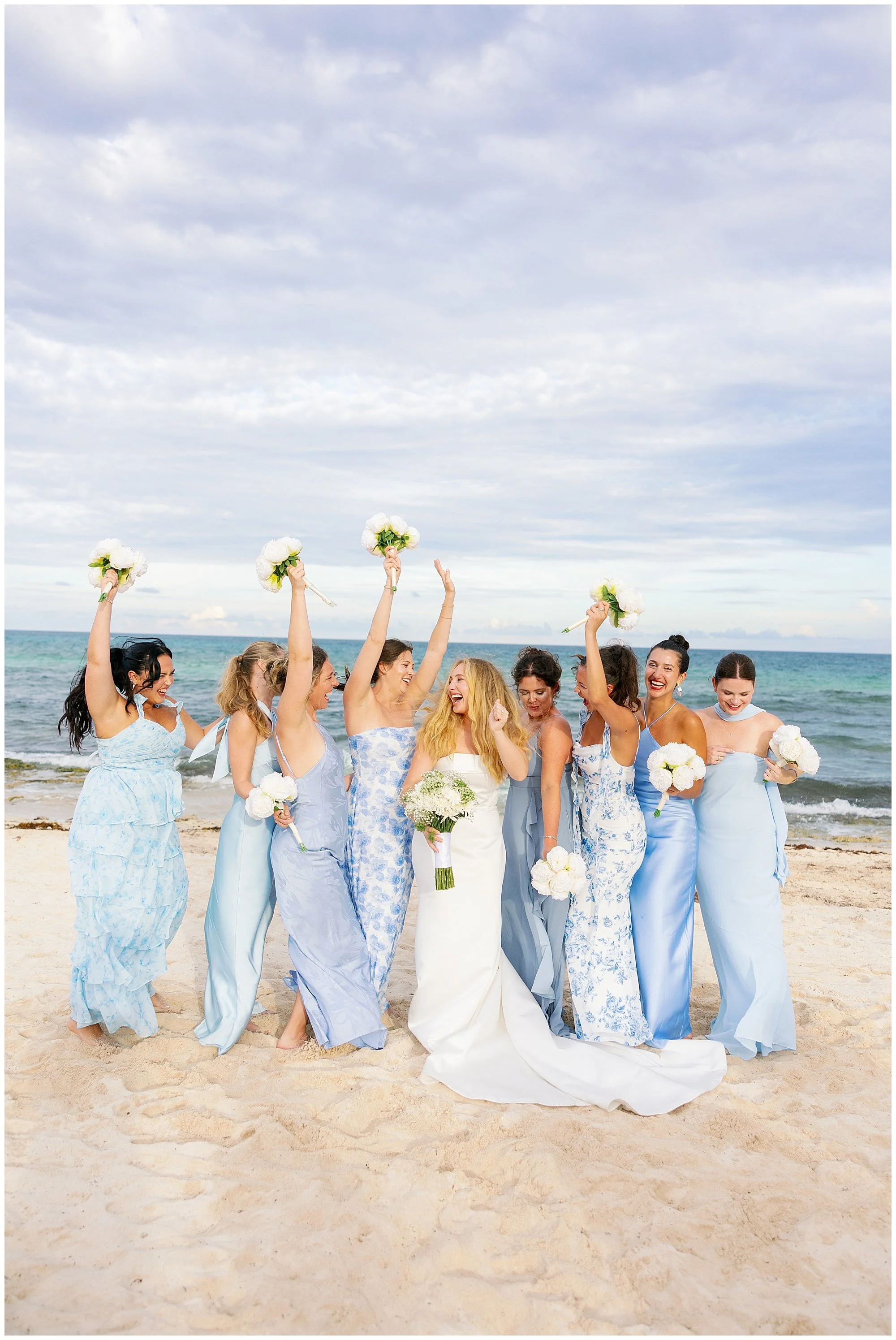  bridesmaids dancing on the beach at valentin imperial resort in riviera maya 