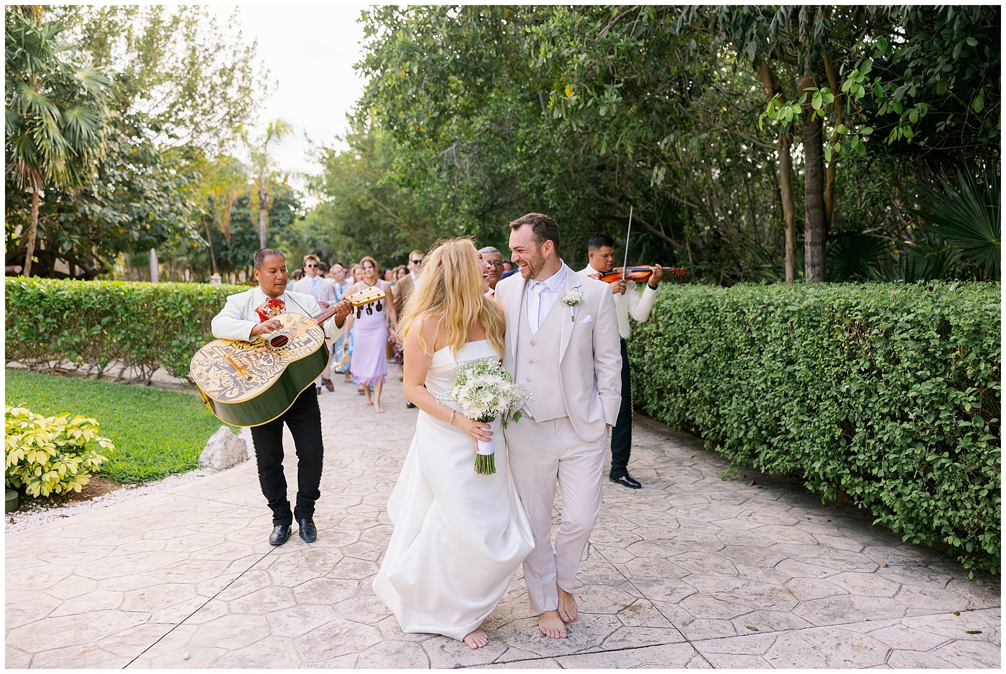  bride and groom with mariachi band at valentin imperial resort in riviera maya 
