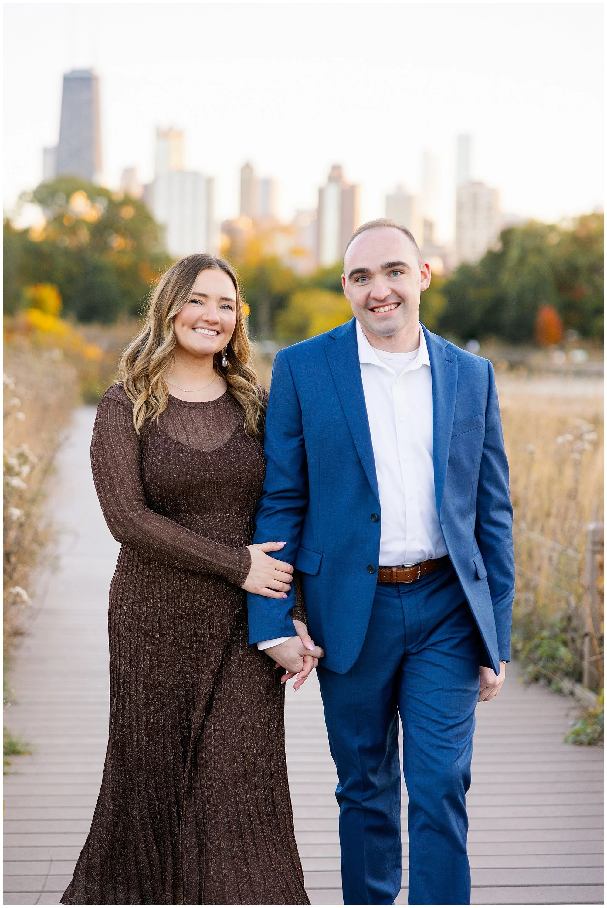  couple walking at nature boardwalk in lincoln park zoo 