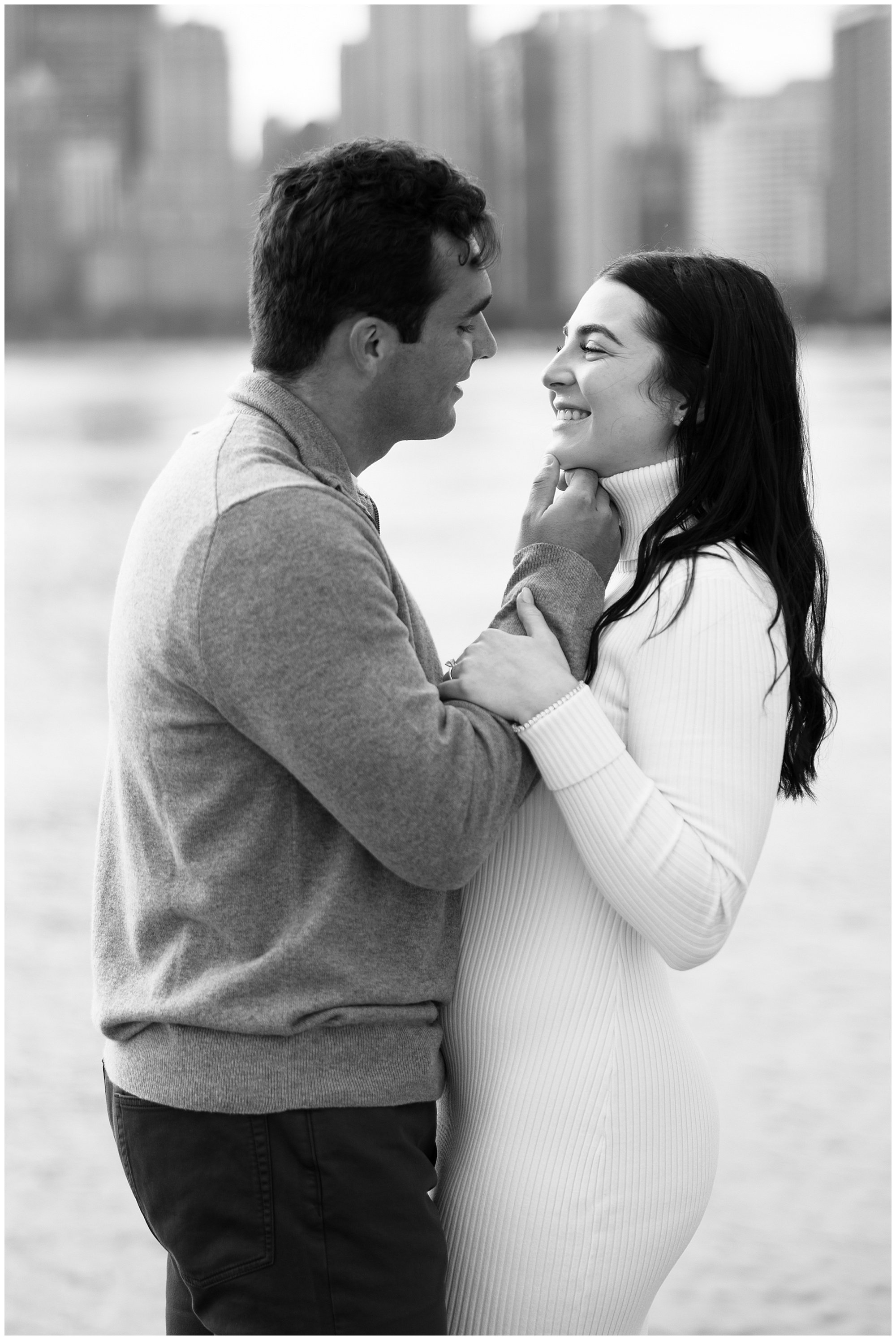  couple going in for a kiss at north avenue beach 