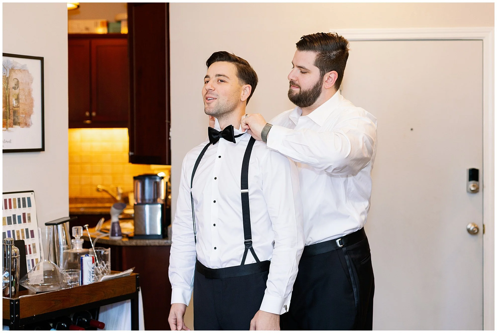  groom getting ready for rockwell on the river wedding 