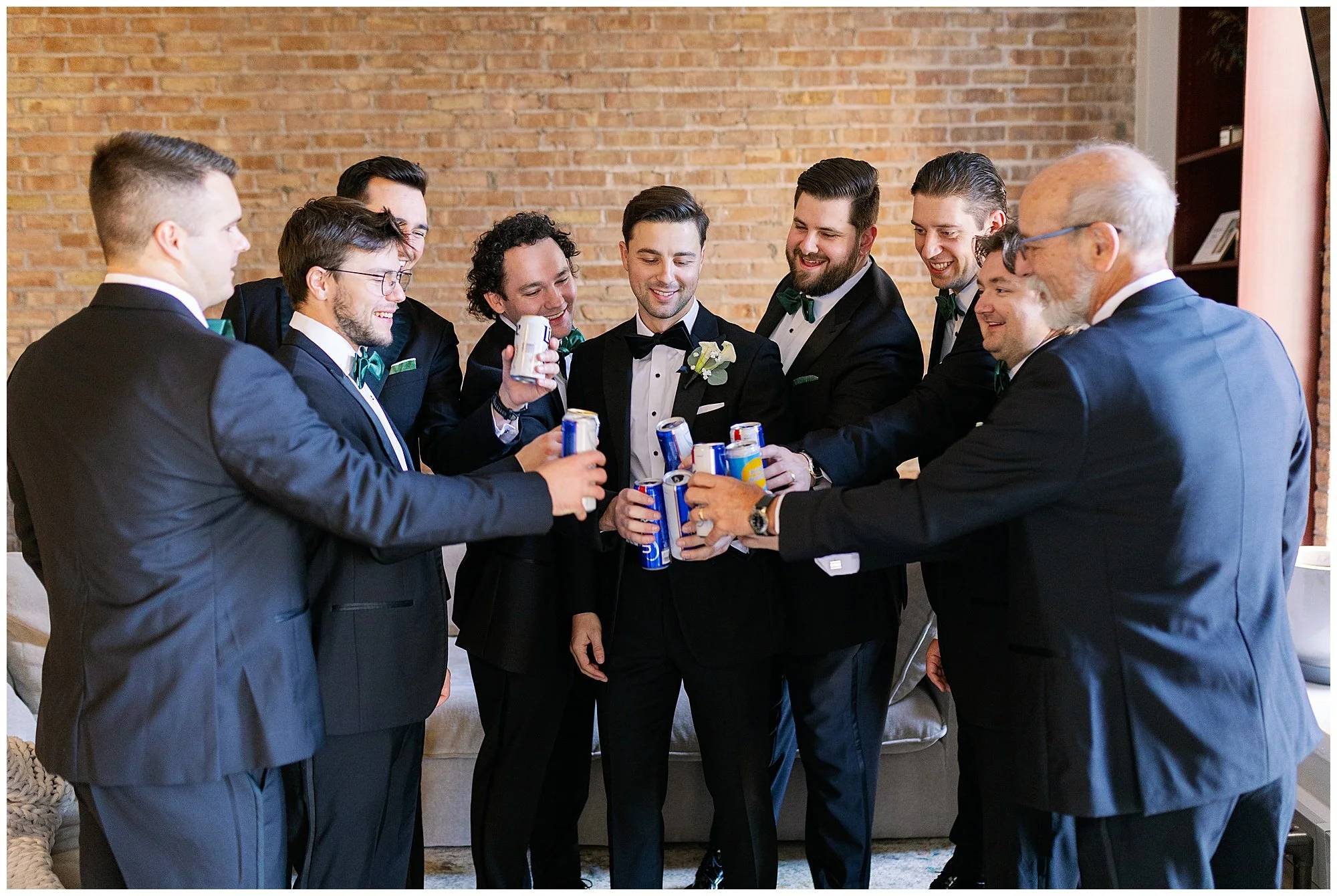  groomsmen cheering before rockwell on the river wedding 