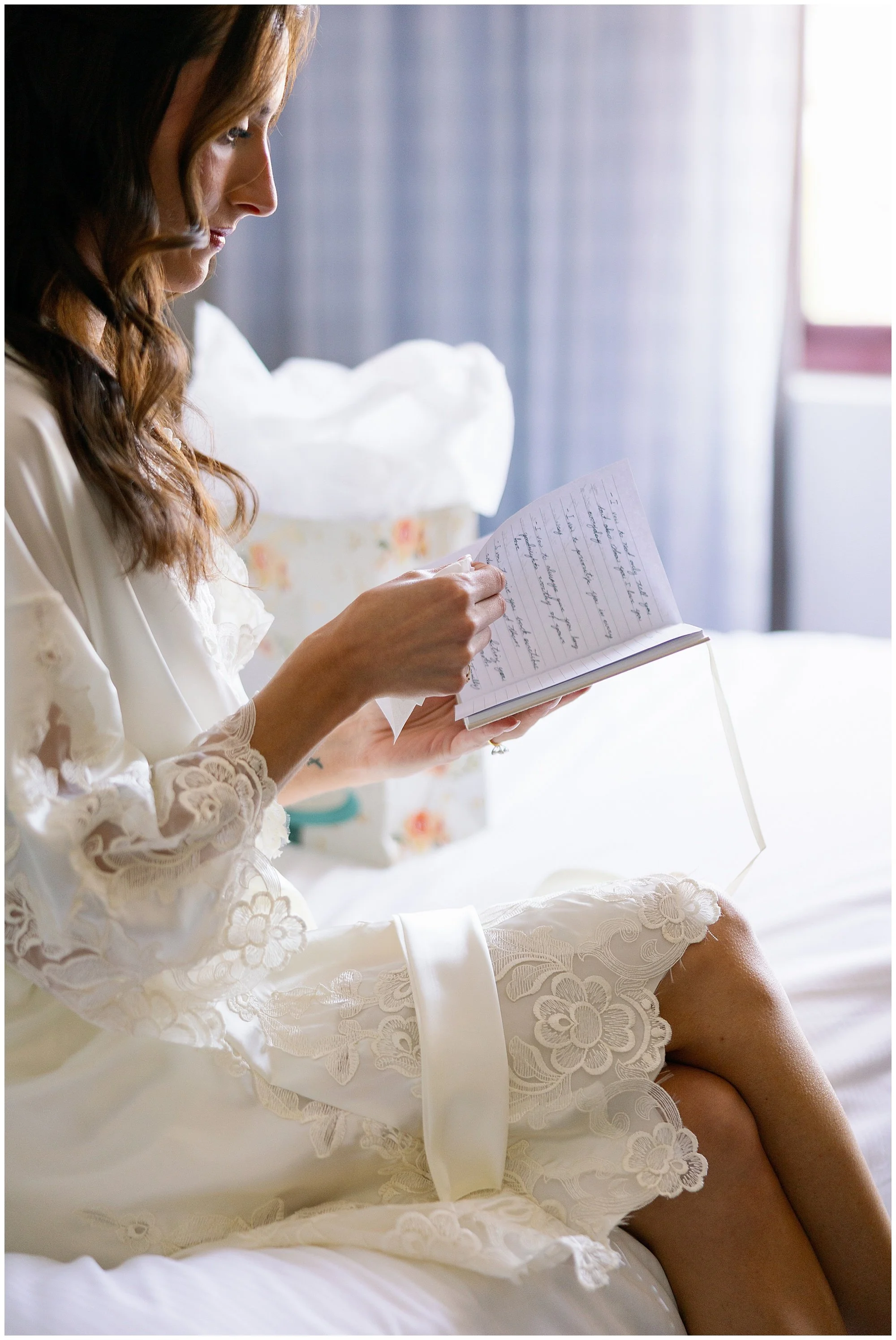  bride reading note before rockwell on the river wedding 
