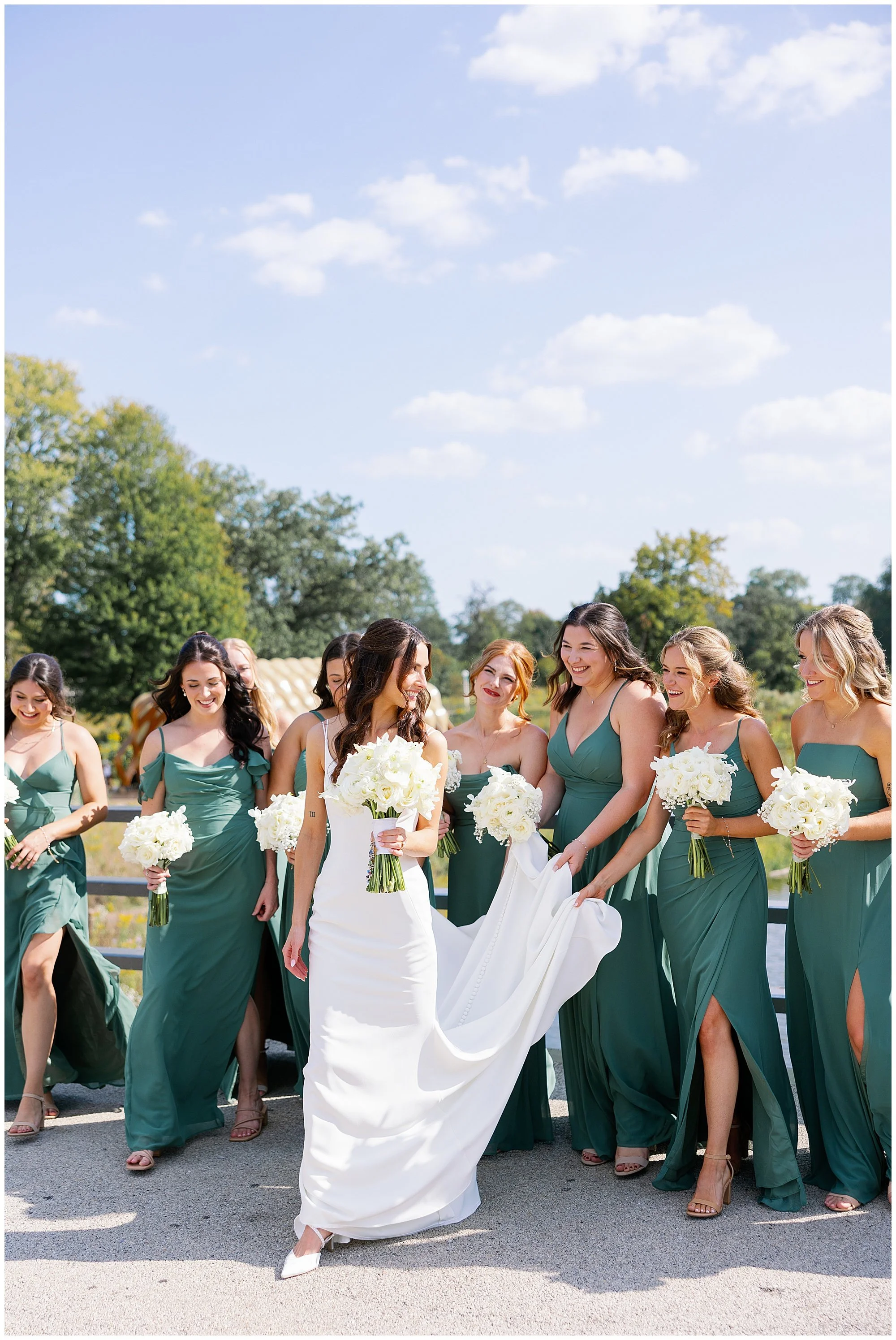  bridesmaids walking at lincoln park zoo south pond 