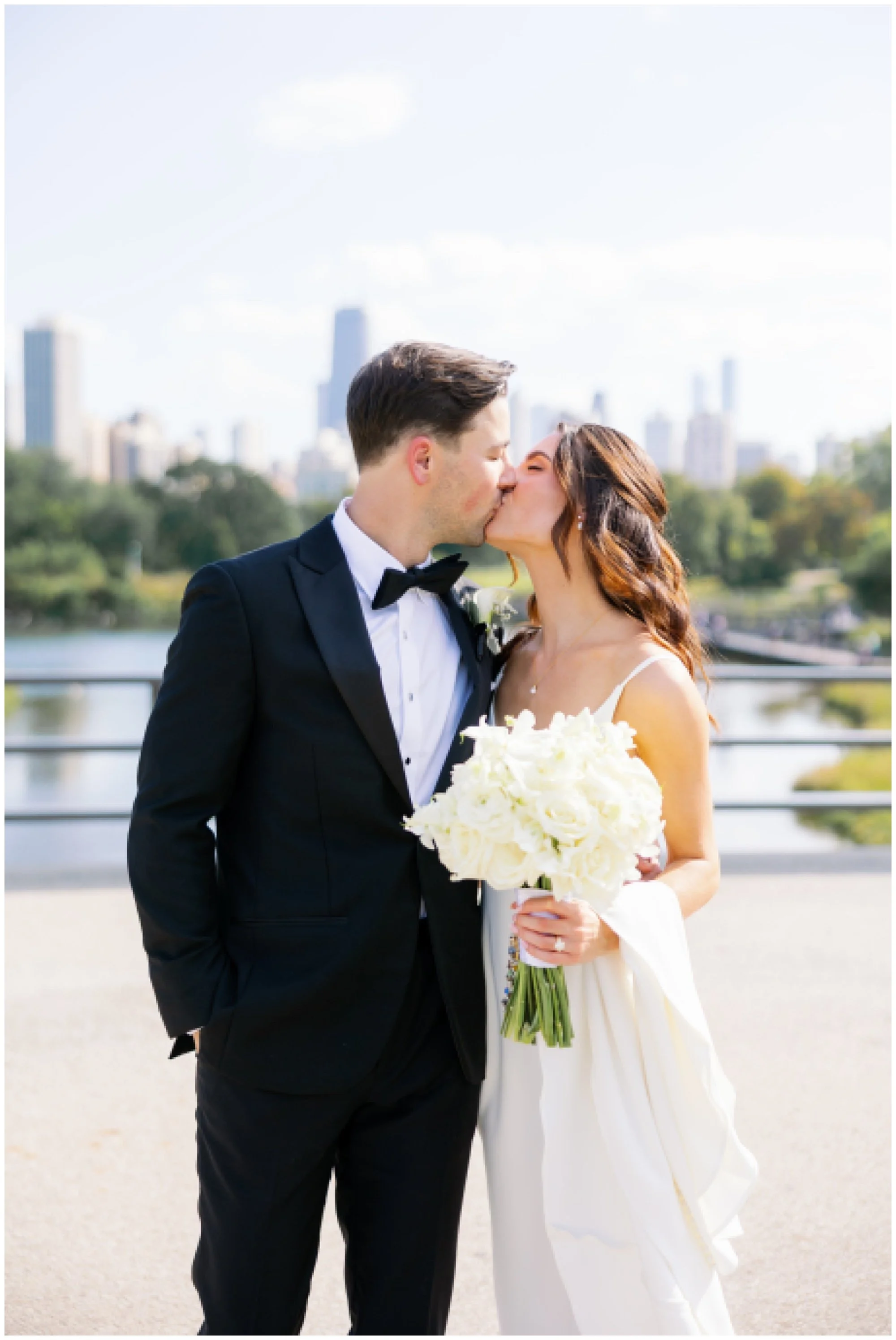  bride and groom kissing at lincoln park zoo south pond 