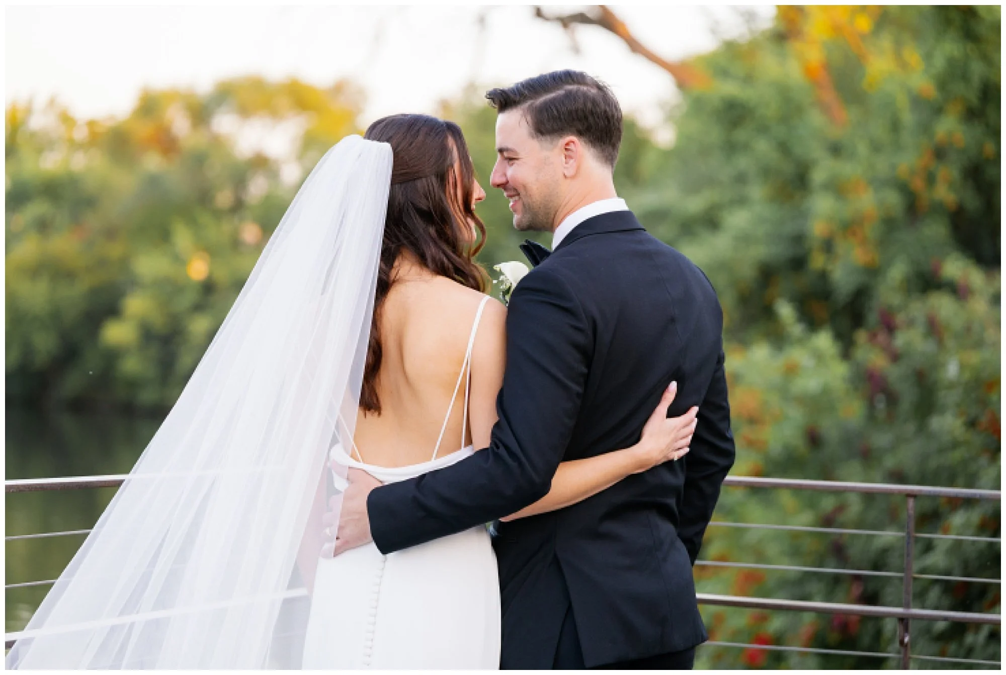  bride and groom looking at each other at rockwell on the river wedding 