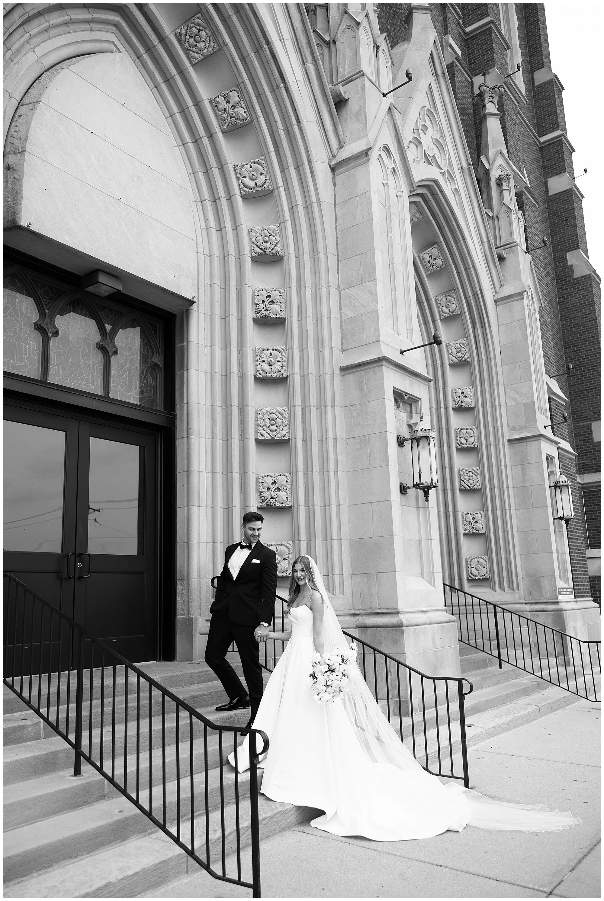  bride and groom walking up stairs for  Mesón Sabika wedding  