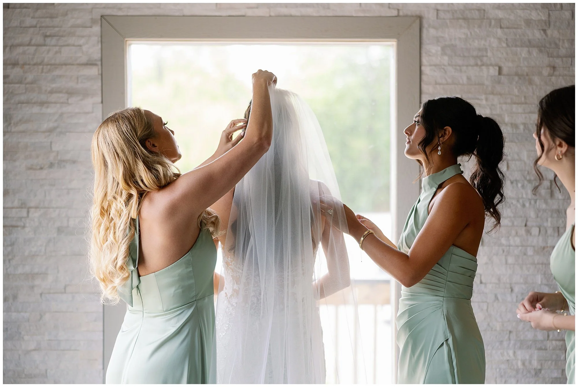  allure on the lake bride getting veil on 