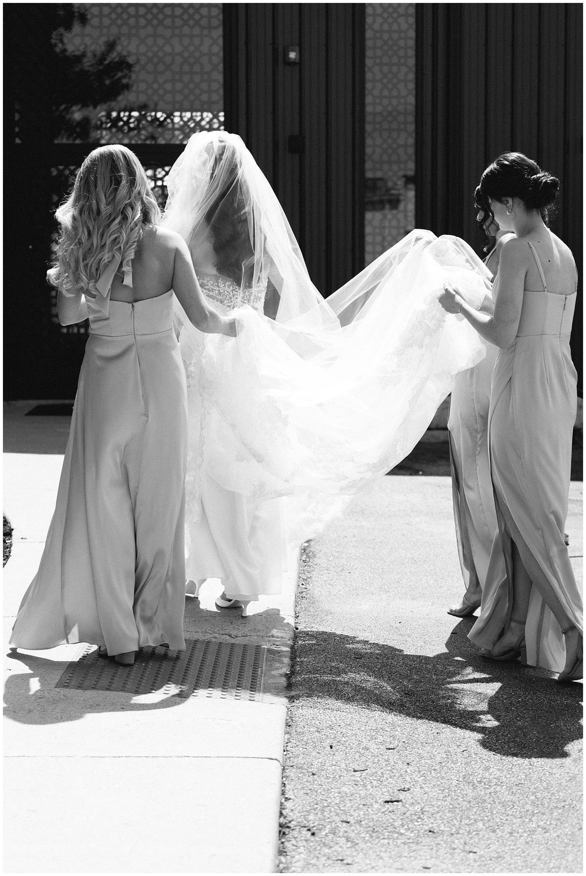  allure on the lake bride walking with bridesmaids 