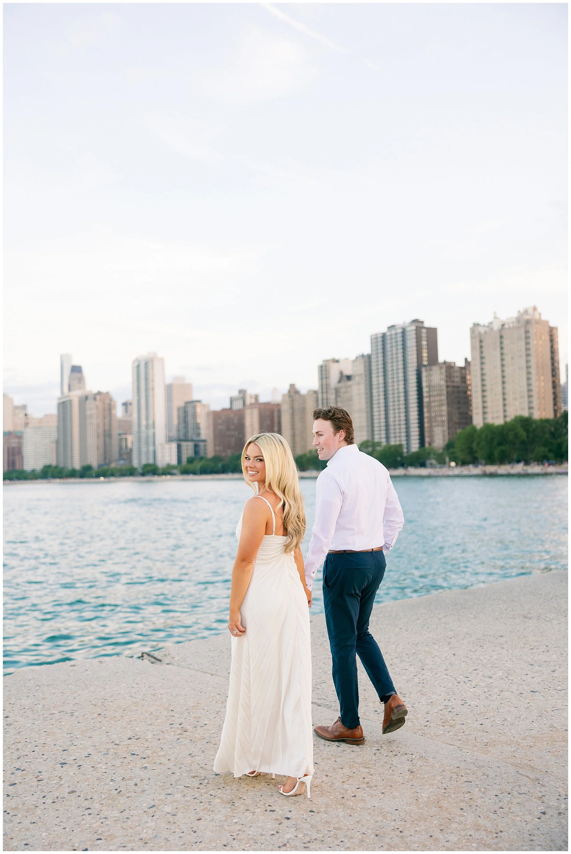  couple walking at north ave beach engagement photos 