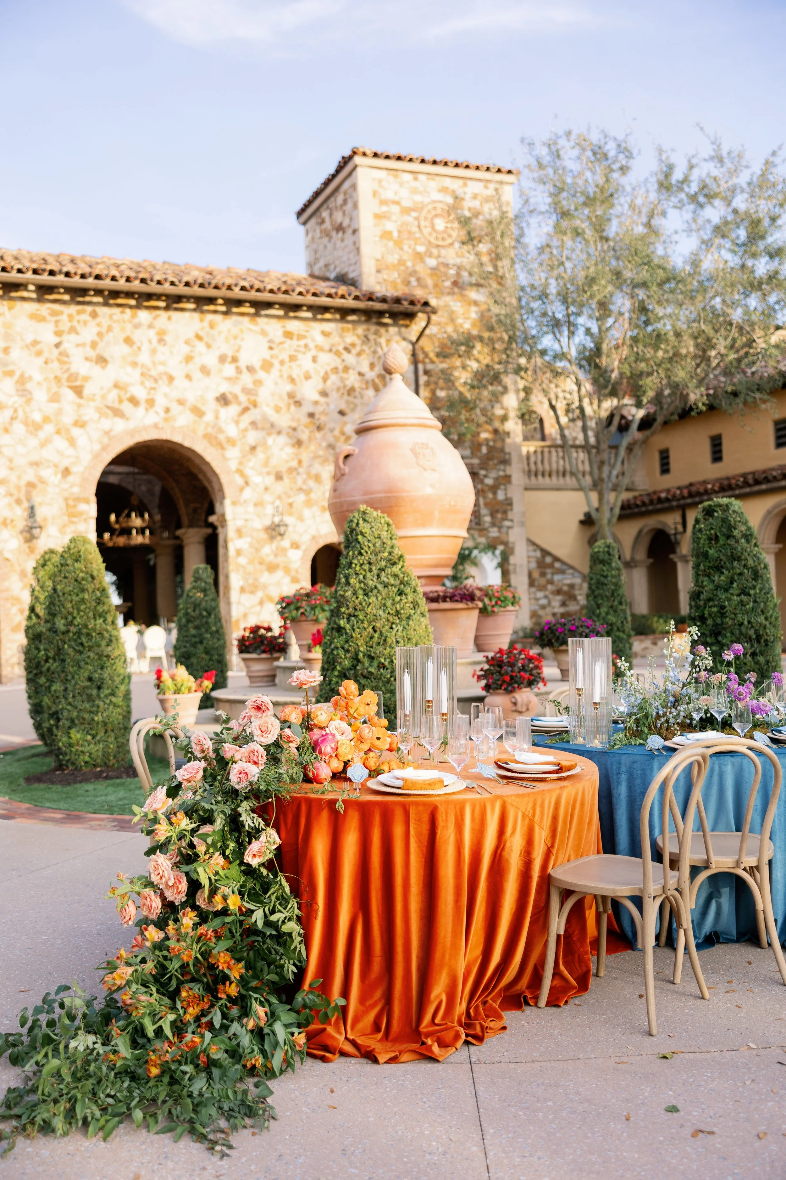 reception details with colorful flowers at bella collina