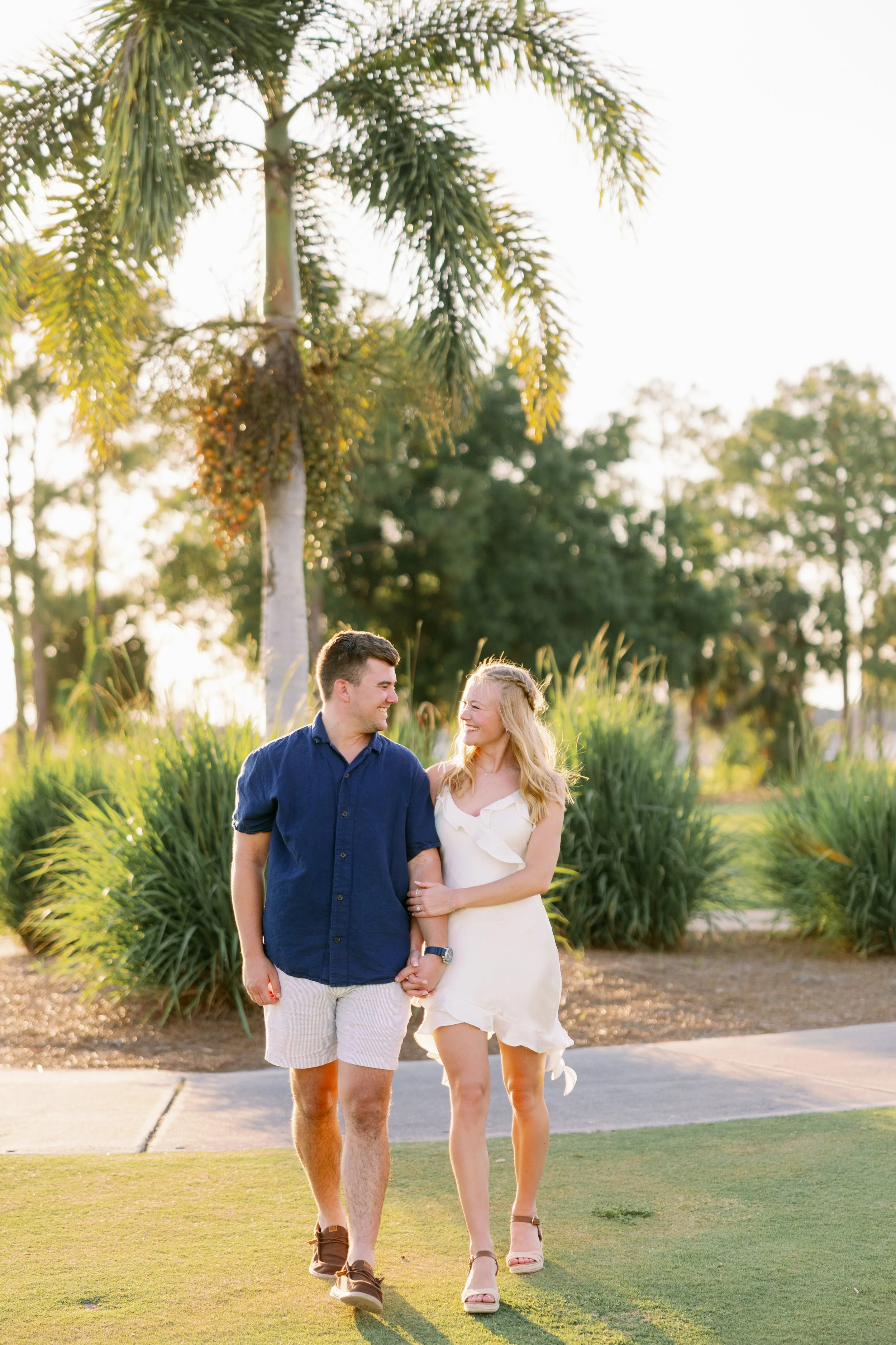 ft myers engagement photography couple walking