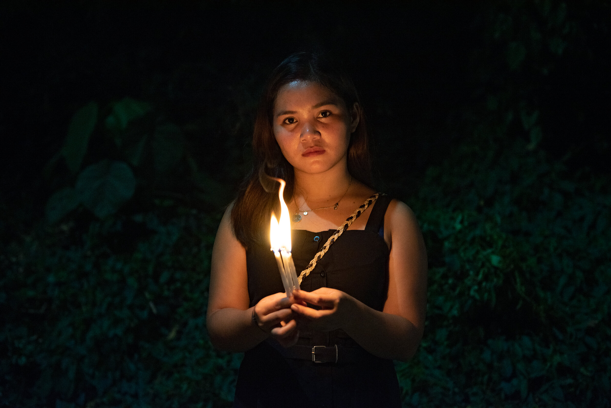  Marinel Ubaldo, a typhoon Haiyan survivor, holding a lit candle in commemoration of the typhoon's 6th Anniversary last November 8 in Tacloban City, Leyte. Marinel has spoken and attended events all over the world, including the 2015 UN Climate Chang
