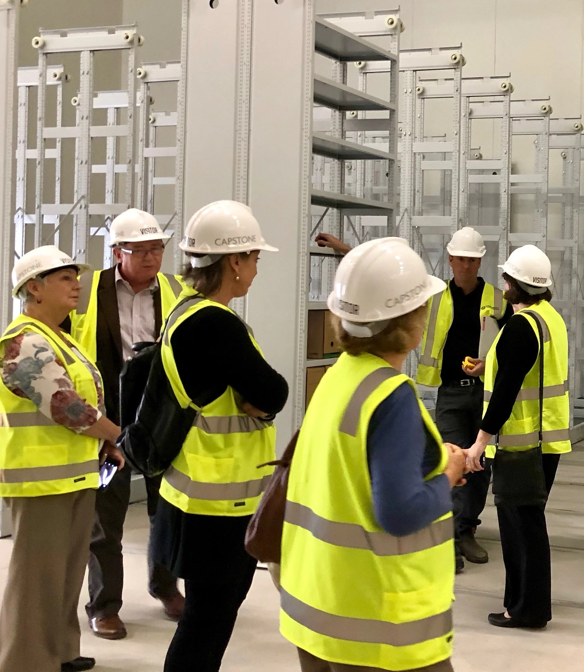  Members of the National Archives Perth Consultative Forum inspecting the new Belmont Repository, with Austrian compactuses used in the Louvre and other major European institutions being installed here — a first in Australia. Note Diane Foster (WAGs), Gerard Foley (SRO) and Helen Munt (PHA and HC) on the left 