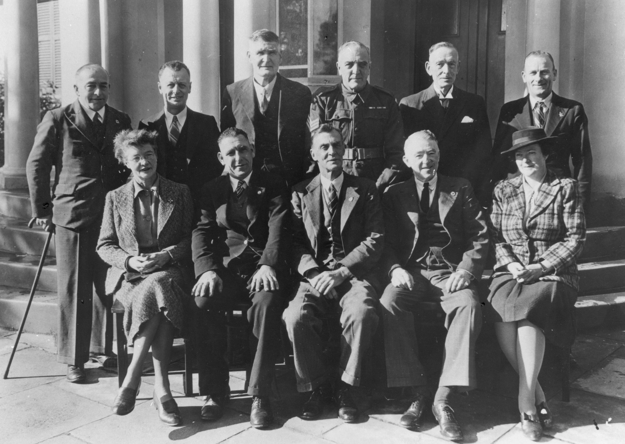  Guildford Municipal Council 1944, outside Guildford Town Hall. Guildford’s history of local government stretches back to 1839, and was the first local council in WA to which two women councillors were elected at the same time. Cr Miss Helena King is on the left, Cr Dr Merab Taubman is on the right. Photo Swan City Library Local History Collections. 
