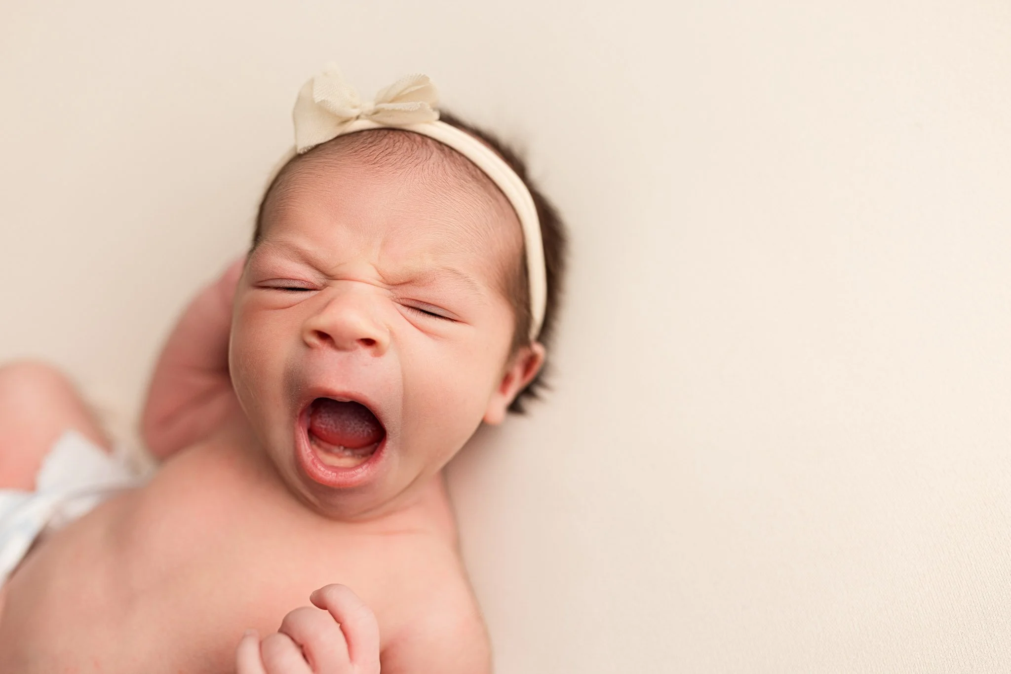 Newborn Yawn Portrait – Natural and Candid Baby Photography