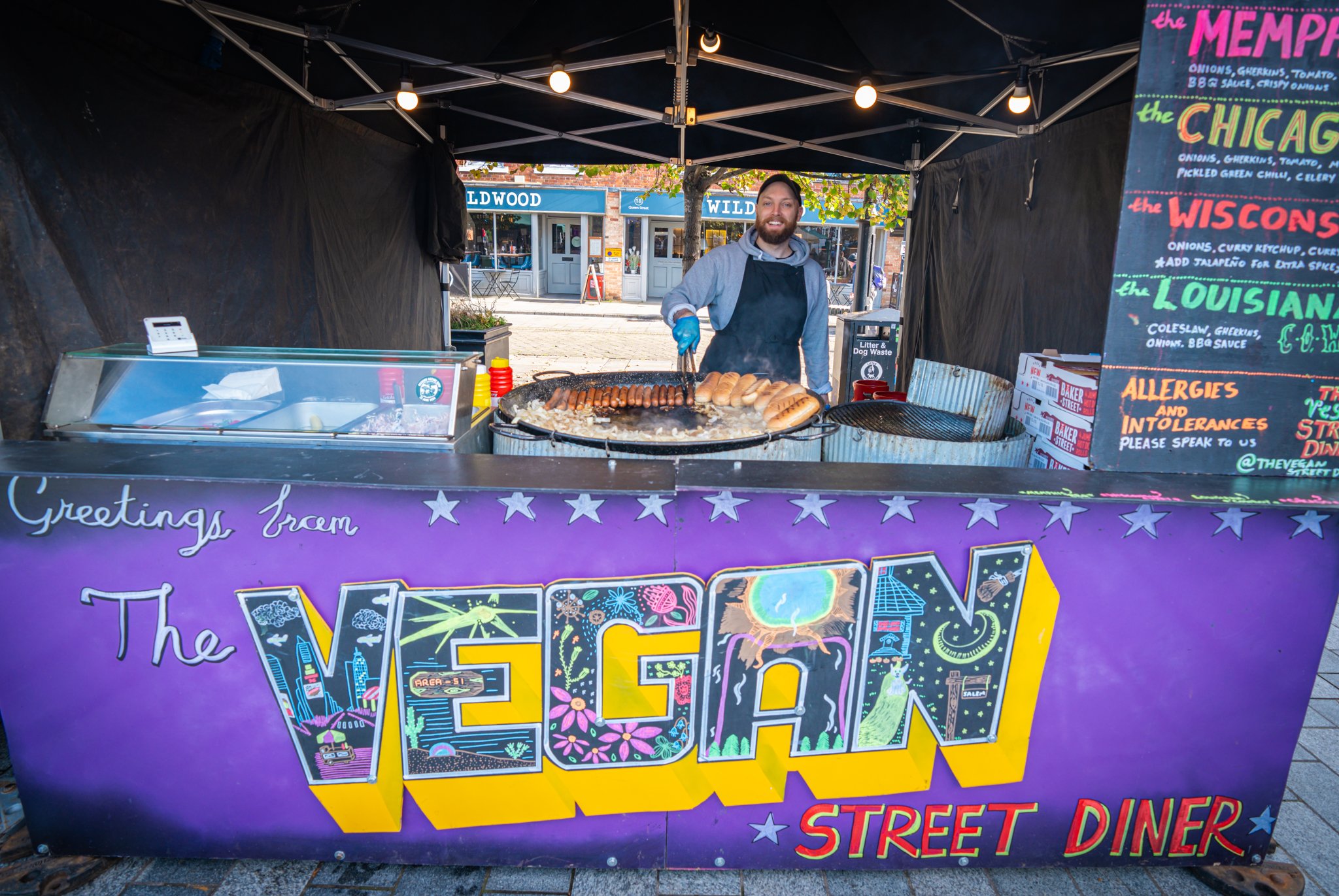 The vegan street diner, Tony serves vegan hot dogs loaded with different condiments and toppings. 