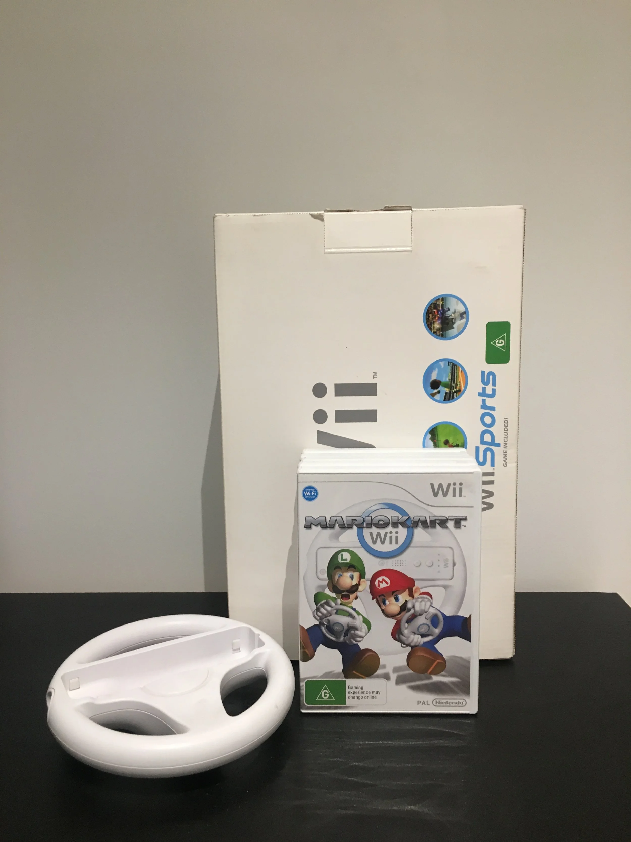 Nintendo Wii + 4 Games — THRIFT SHOP GIFT SHOP