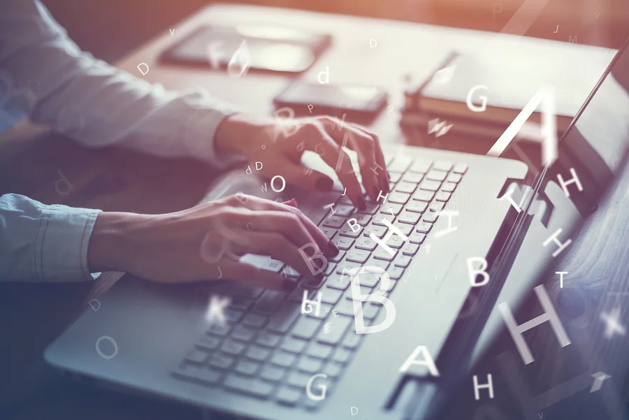 'invest+in+online+editing'+image+of+laptop+and+letters.jpg