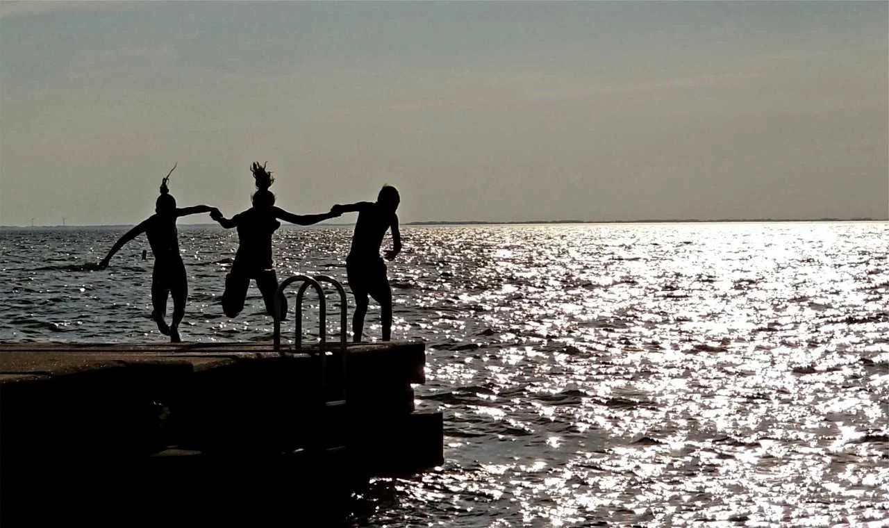 Kids off pier at sunset.jpg