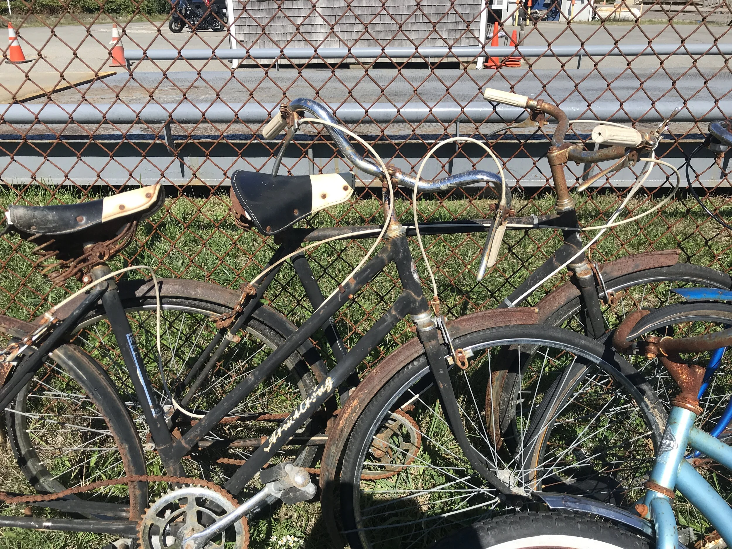 A matching pair of rusty vintage 1960s Armstrong 3-speed bikes at the Provincetown dump.
