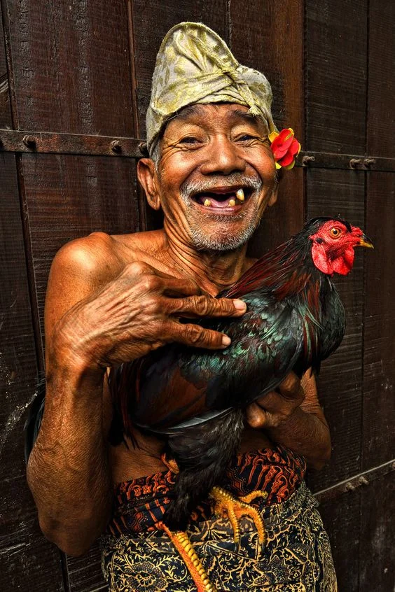 bali man with rooster.jpg