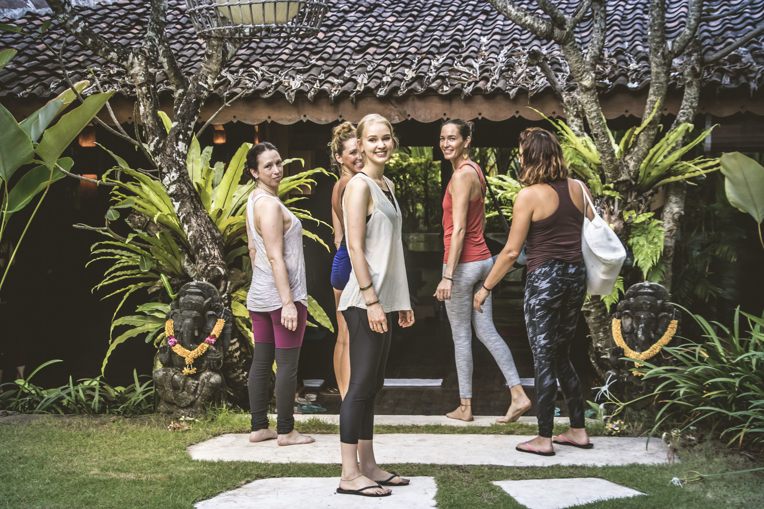 Happy retreat attendee's pose for a photo outside yoga studio (Copy)