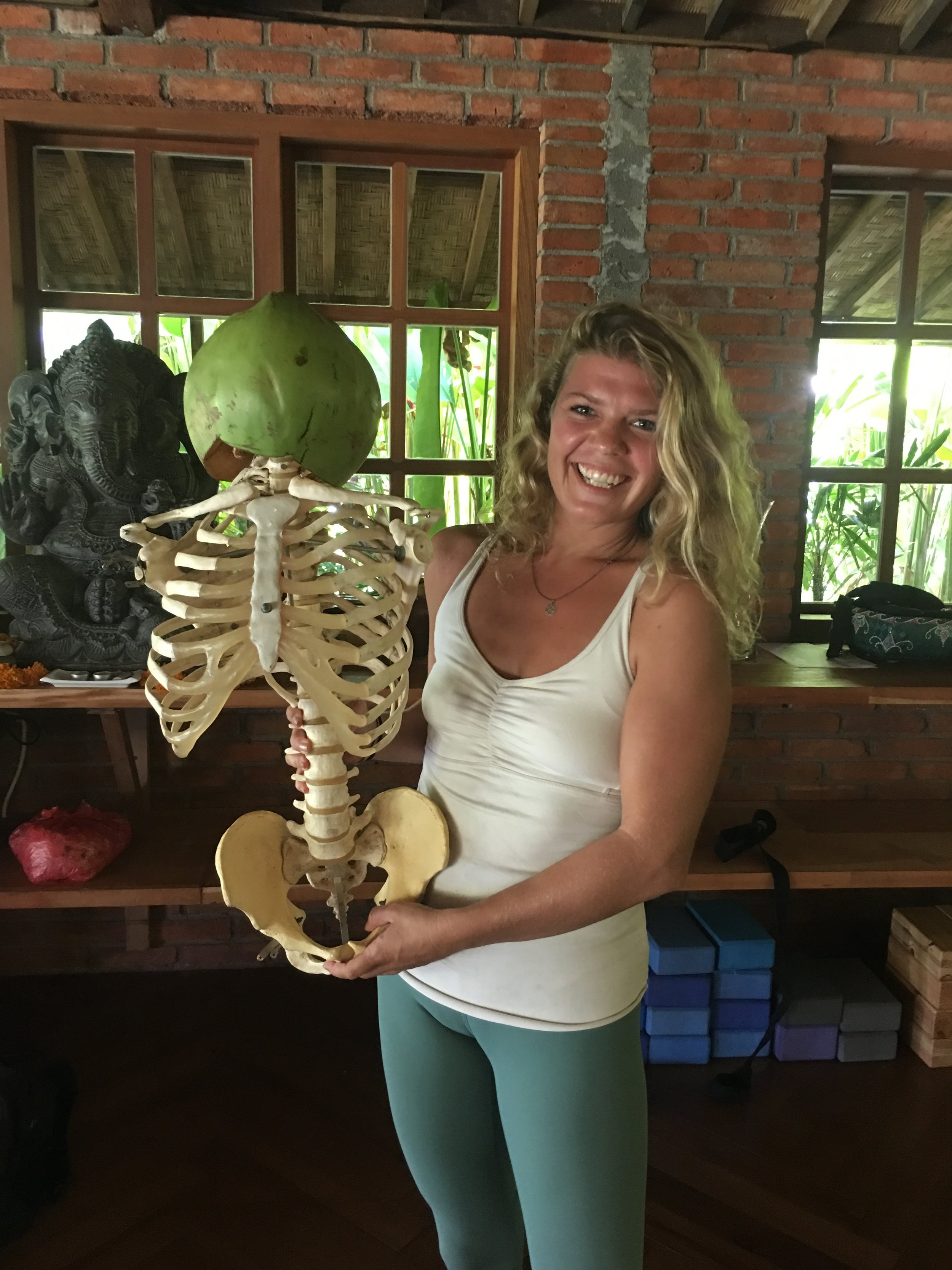 Sattva Yoga Bali vinyasa teacher trainer with skeleton dummy (Copy)