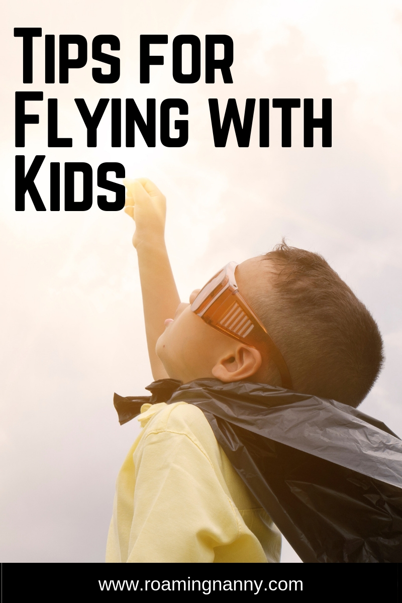  Flying with kids can be a challenge. Here are some tips to make it easy on the whole family. #flying #airplane #travelwithkids 