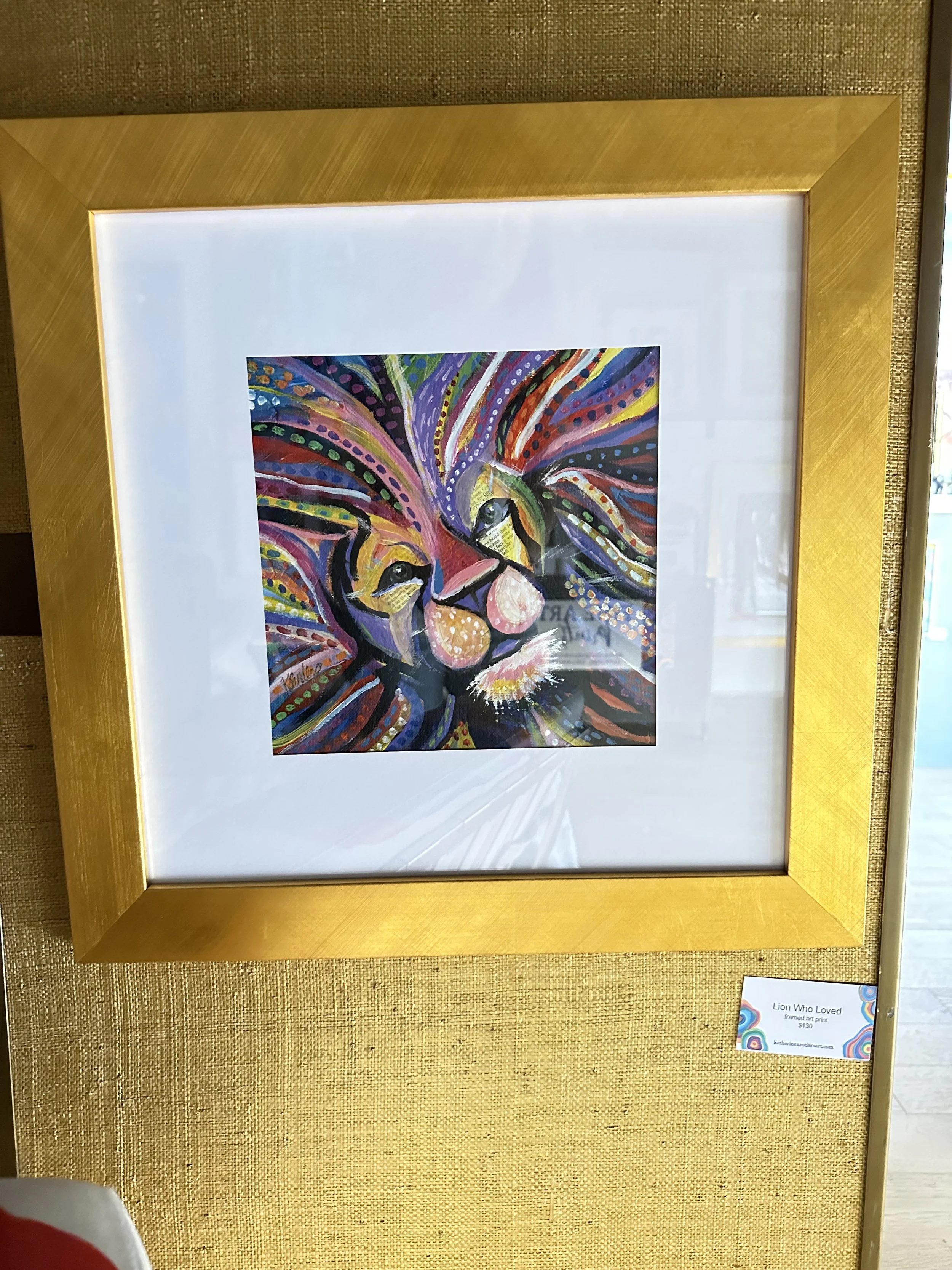 print shown framed in gold