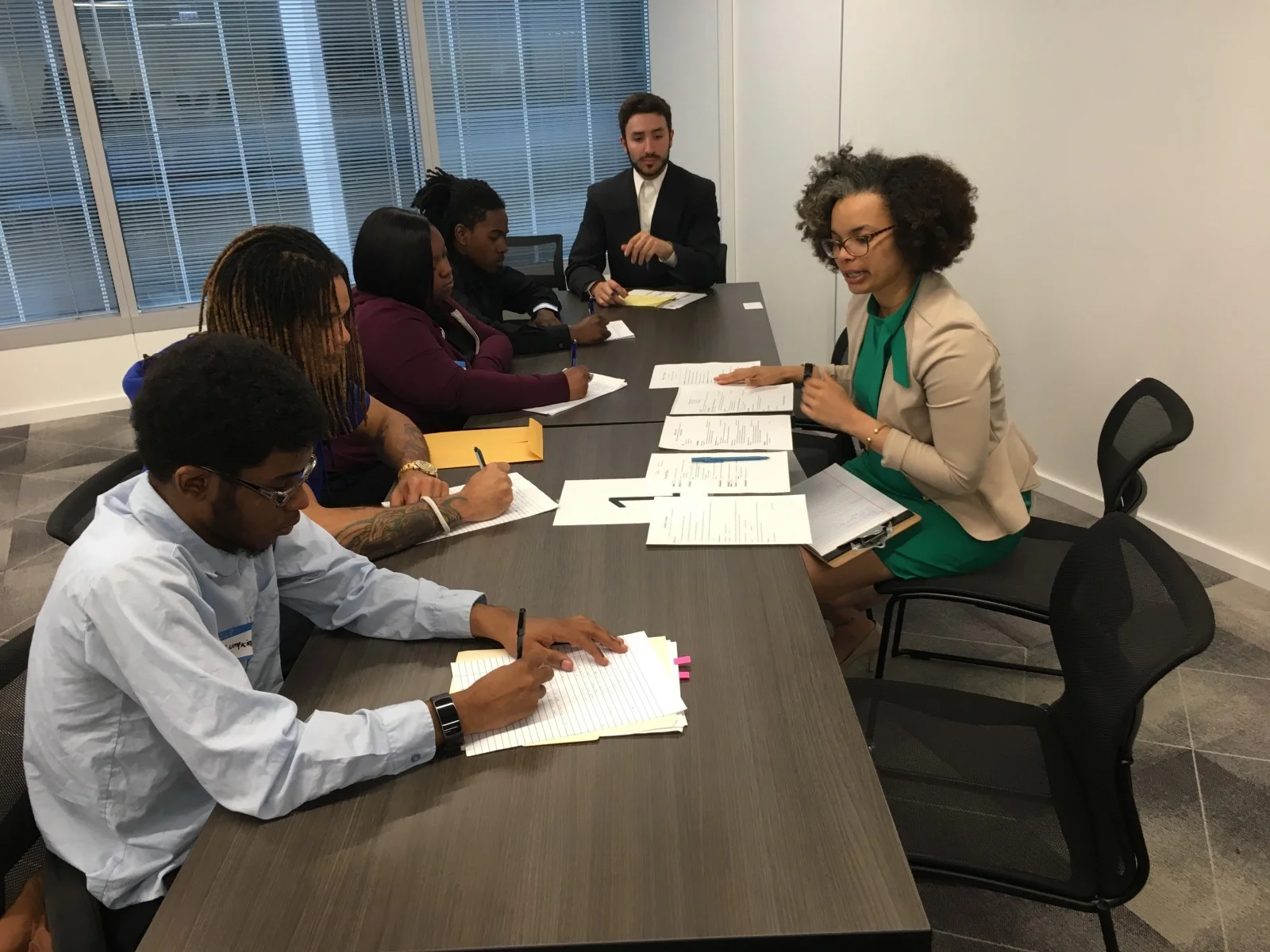 Skills for Chicagoland’s Future employees work on interview training.