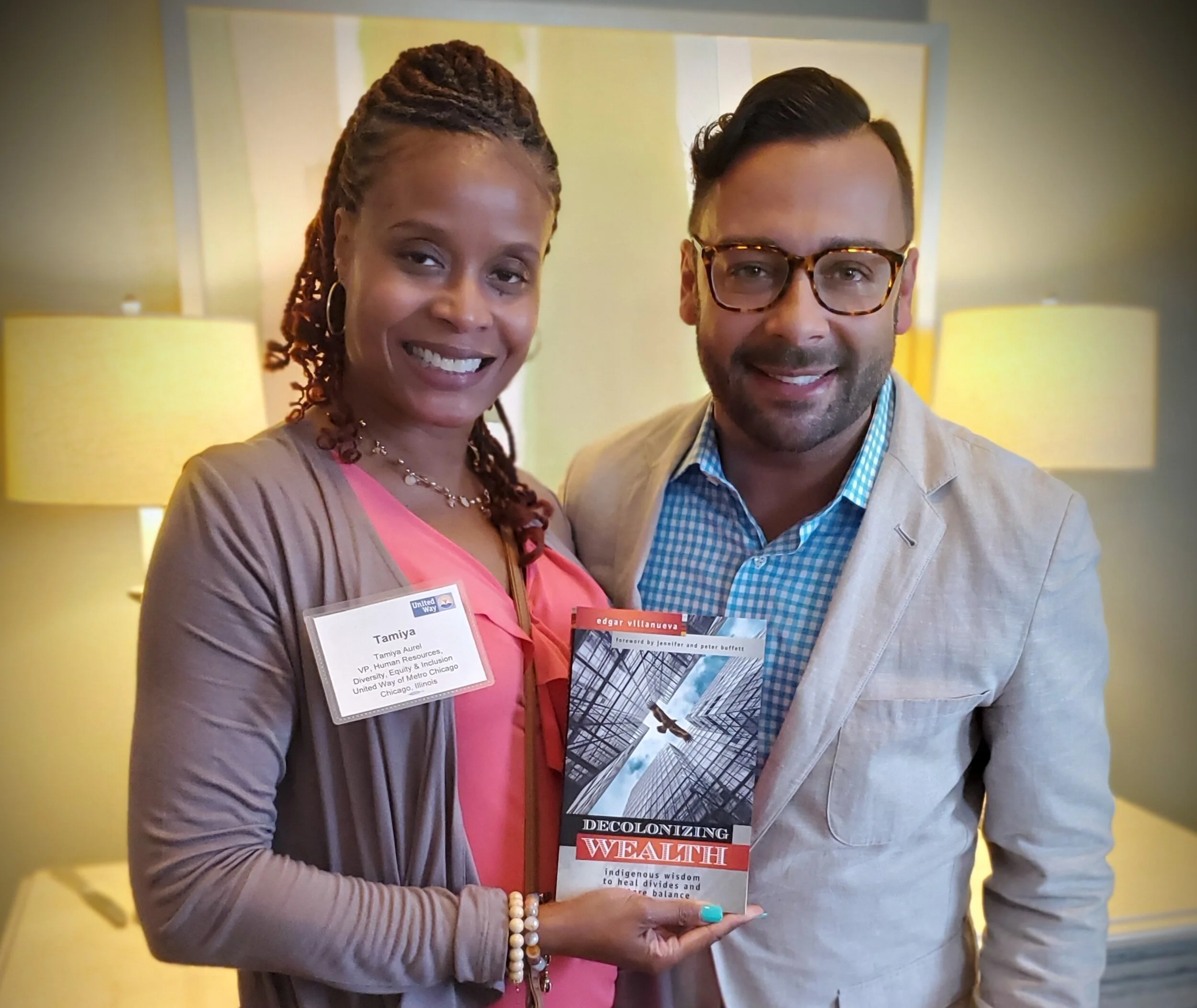 VP of Human Resources, DEI, Tamiya Aurel poses for a photo with the author of “Decolonizing Wealth”, Edgar Villanueva during the United Way Equity Summit in August.
