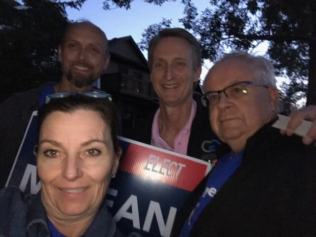Multi-tasking with signs and knocking doors in Sunalta on Friday the 13th. And finishing up with less sunlight than we are used to!