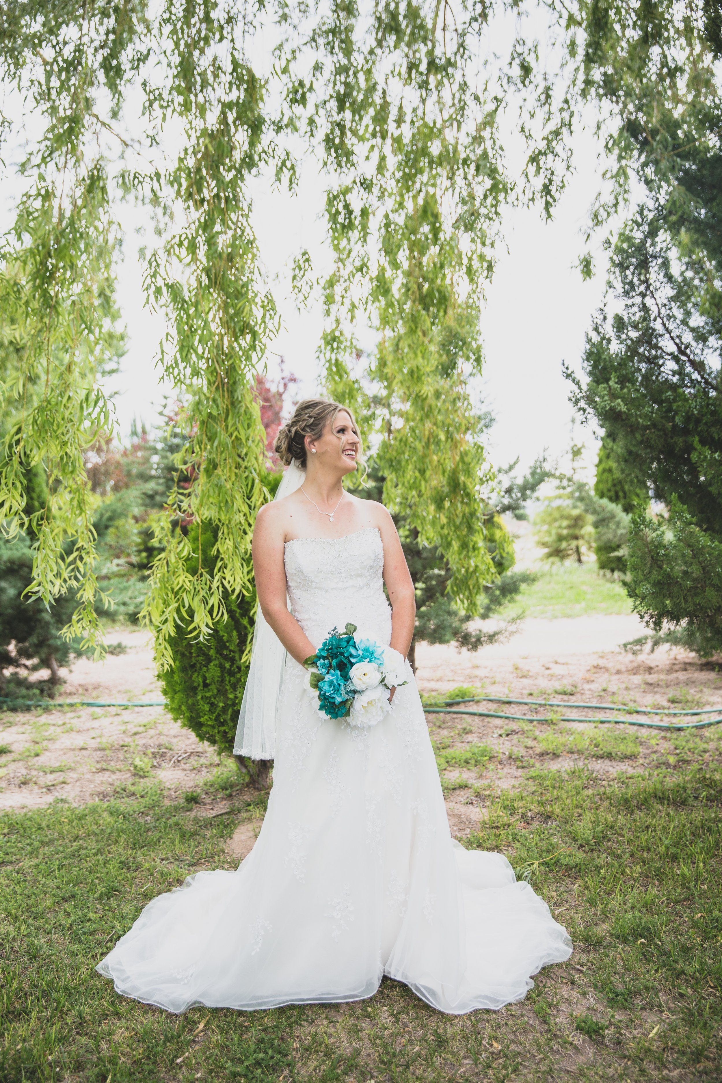  Portrait of Bride and bouquet  at Arizona wedding by Northern Arizona Wedding Photographer, Jennifer Lind Schutsky.  