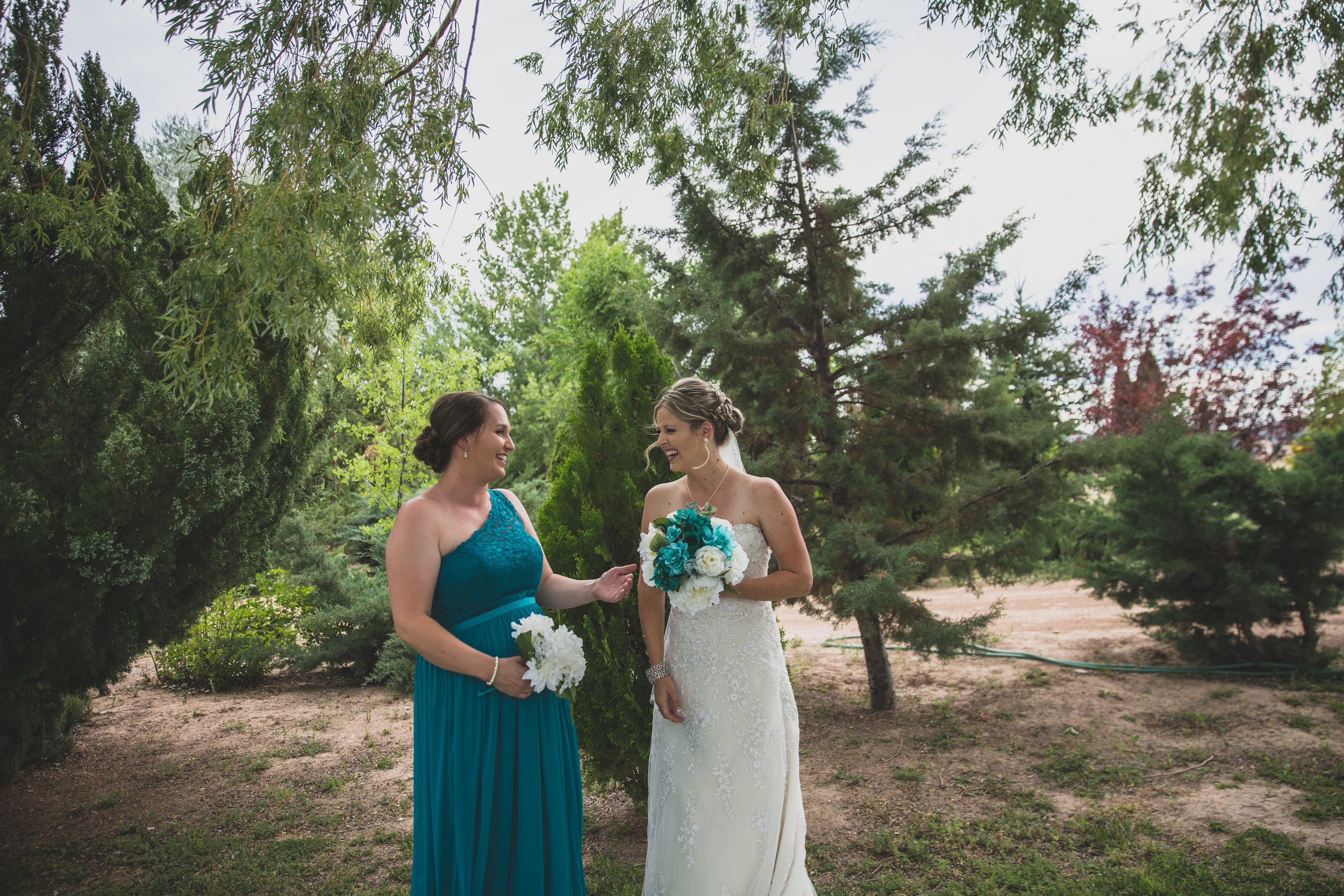  Teal dress at Arizona wedding by Northern Arizona Wedding Photographer, Jennifer Lind Schutsky.  