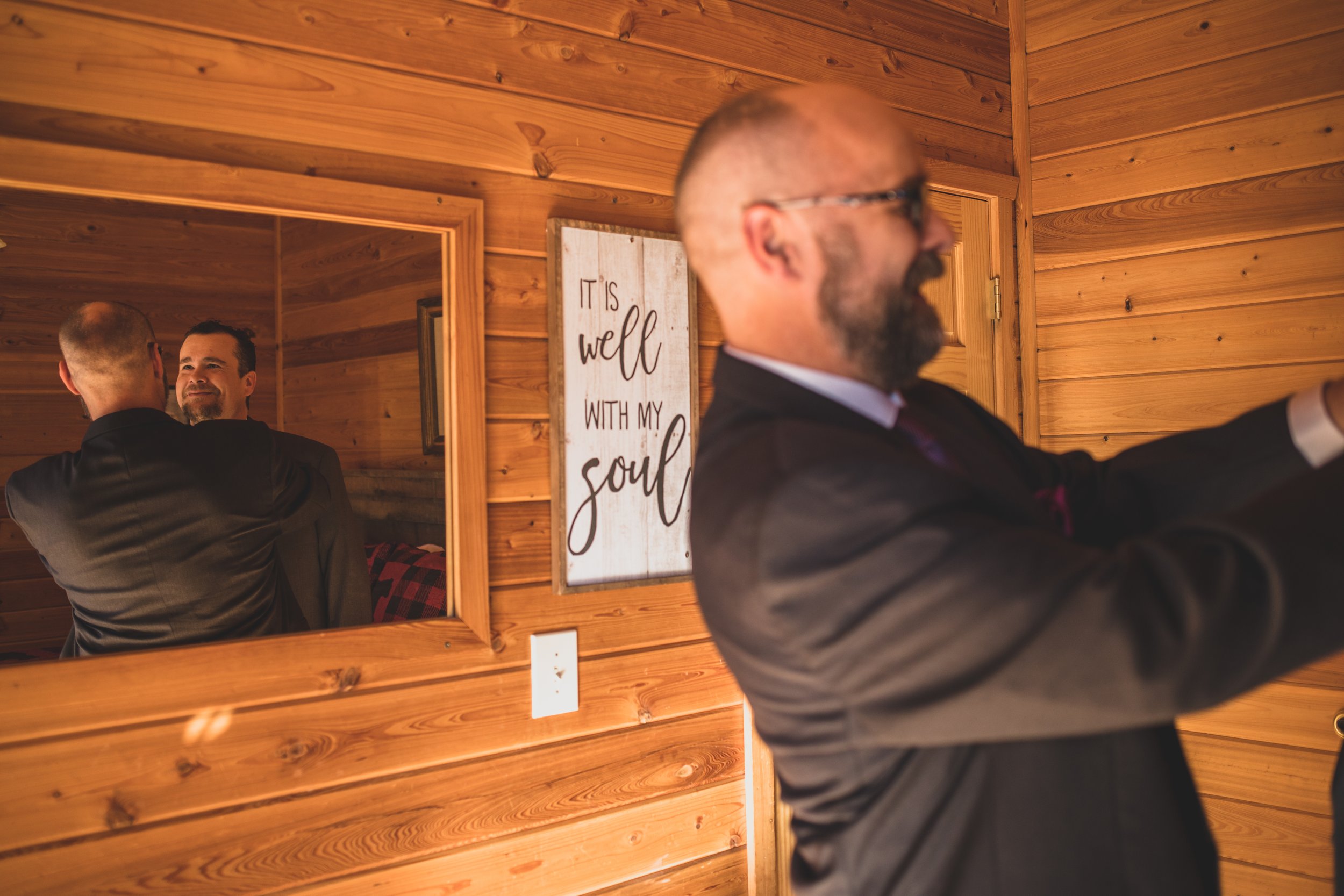  Groom getting ready at Northern Arizona Rim Elopement by Arizona Destination Photographer Jennifer Lind Schutsky 