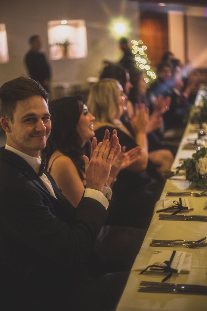  Guests enjoy dinner at Christmas theme wedding reception at Grayhawk Golf Club by Scottsdale Wedding Photographer Jennifer Lind Schutsky 