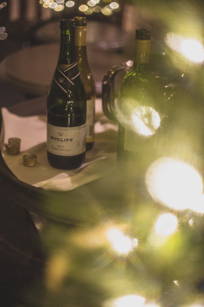  Wine selection at Christmas theme wedding reception at Grayhawk Golf Club by Scottsdale Wedding Photographer Jennifer Lind Schutsky. 