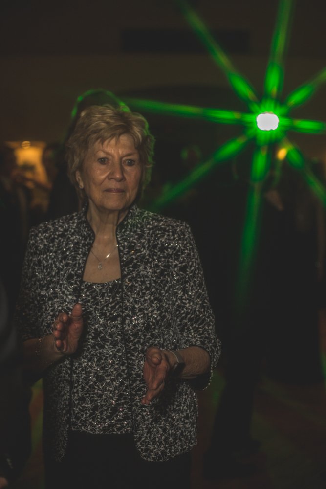  Guests celebrate at Christmas theme wedding reception at Grayhawk Golf Club by Scottsdale Wedding Photographer Jennifer Lind Schutsky. 