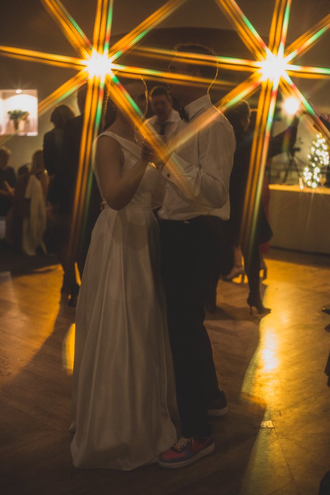  Guests celebrate at Christmas theme wedding reception at Grayhawk Golf Club by Scottsdale Wedding Photographer Jennifer Lind Schutsky. 