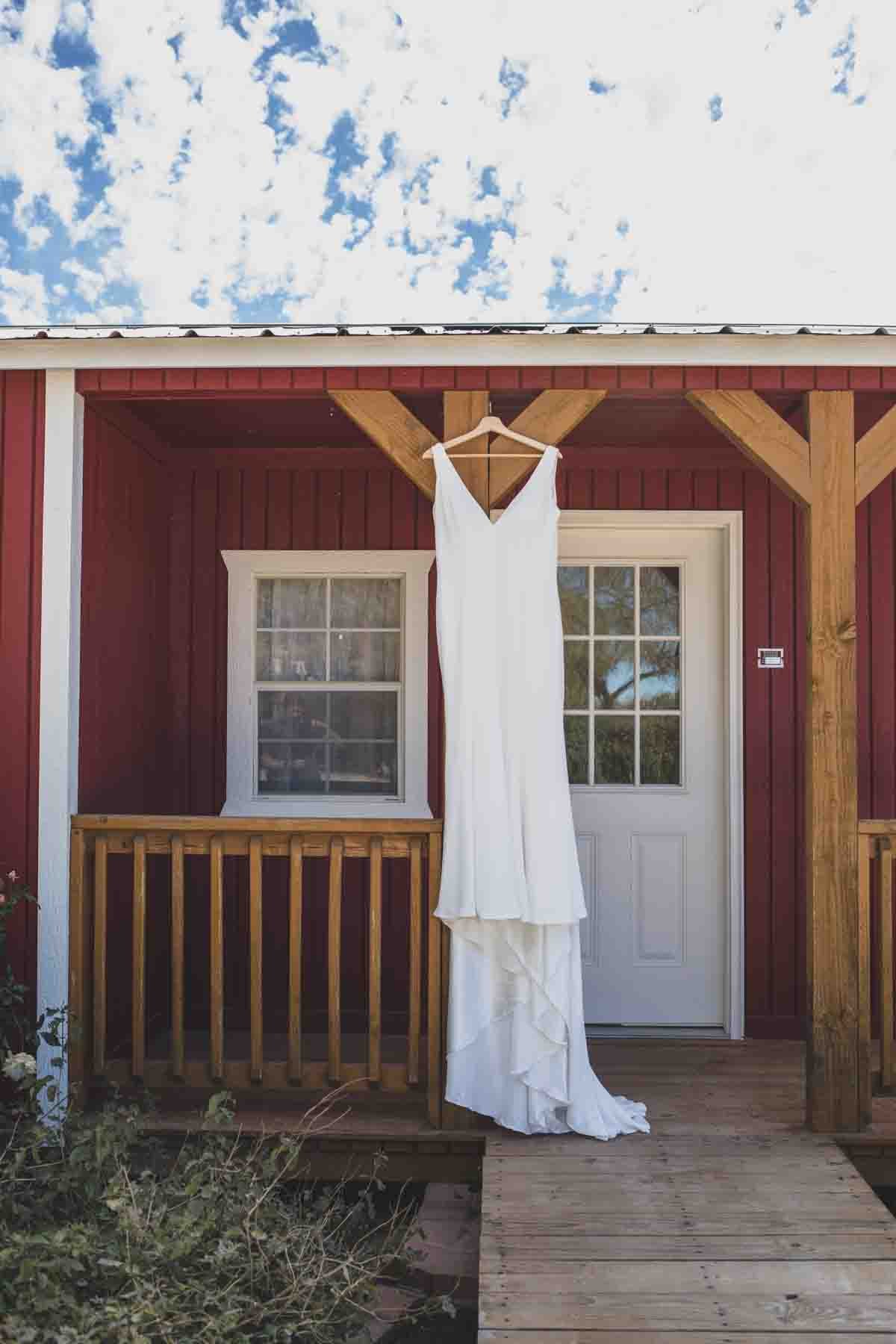  Bride’s dress, Getting Ready, and Detail photos from Mexican Cowboy / Vaquero Farm wedding at Schnepf Farms in Queen Creek, Arizona by Arizona based Photographer, Jennifer Lind Schutsky. 