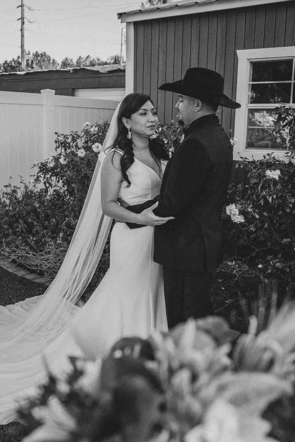  Bride and Groom at Mexican Cowboy / Vaquero Farm Wedding at the Big Red Barn wedding at Schnepf Farms in Queen Creek, Arizona by Arizona based Photographer, Jennifer Lind Schutsky. 