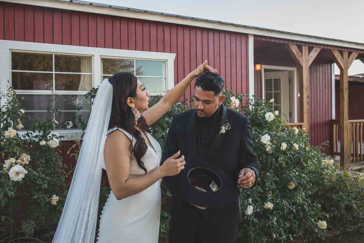  Bride and Groom at Mexican Cowboy / Vaquero Farm Wedding at the Big Red Barn wedding at Schnepf Farms in Queen Creek, Arizona by Arizona based Photographer, Jennifer Lind Schutsky. 