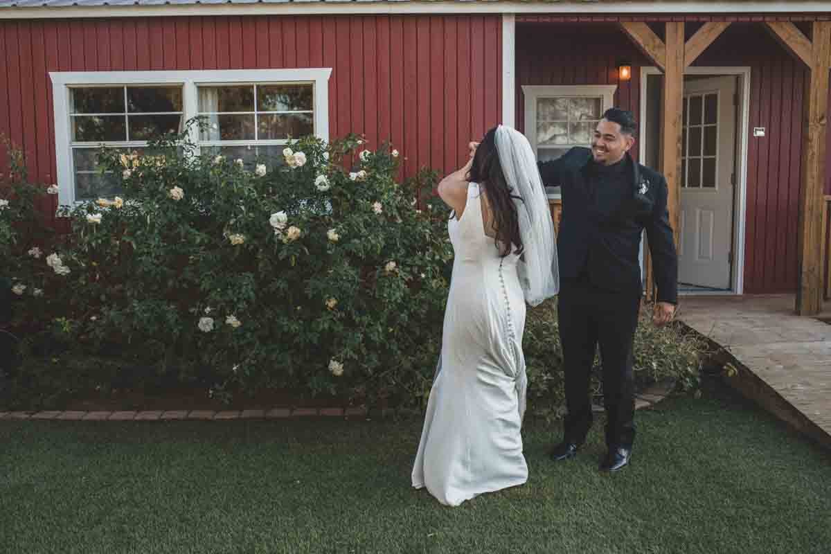  Bride and Groom at Mexican Cowboy / Vaquero Farm Wedding at the Big Red Barn wedding at Schnepf Farms in Queen Creek, Arizona by Arizona based Photographer, Jennifer Lind Schutsky. 