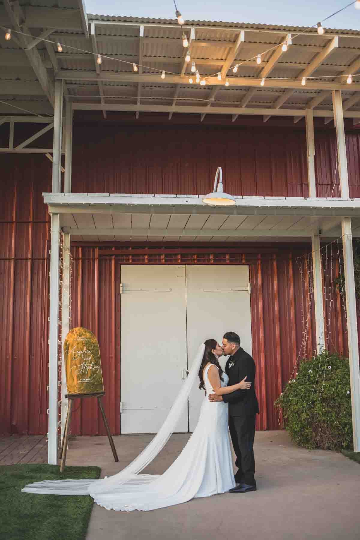  Bride and Groom at Mexican Cowboy / Vaquero Farm Wedding at the Big Red Barn wedding at Schnepf Farms in Queen Creek, Arizona by Arizona based Photographer, Jennifer Lind Schutsky. 