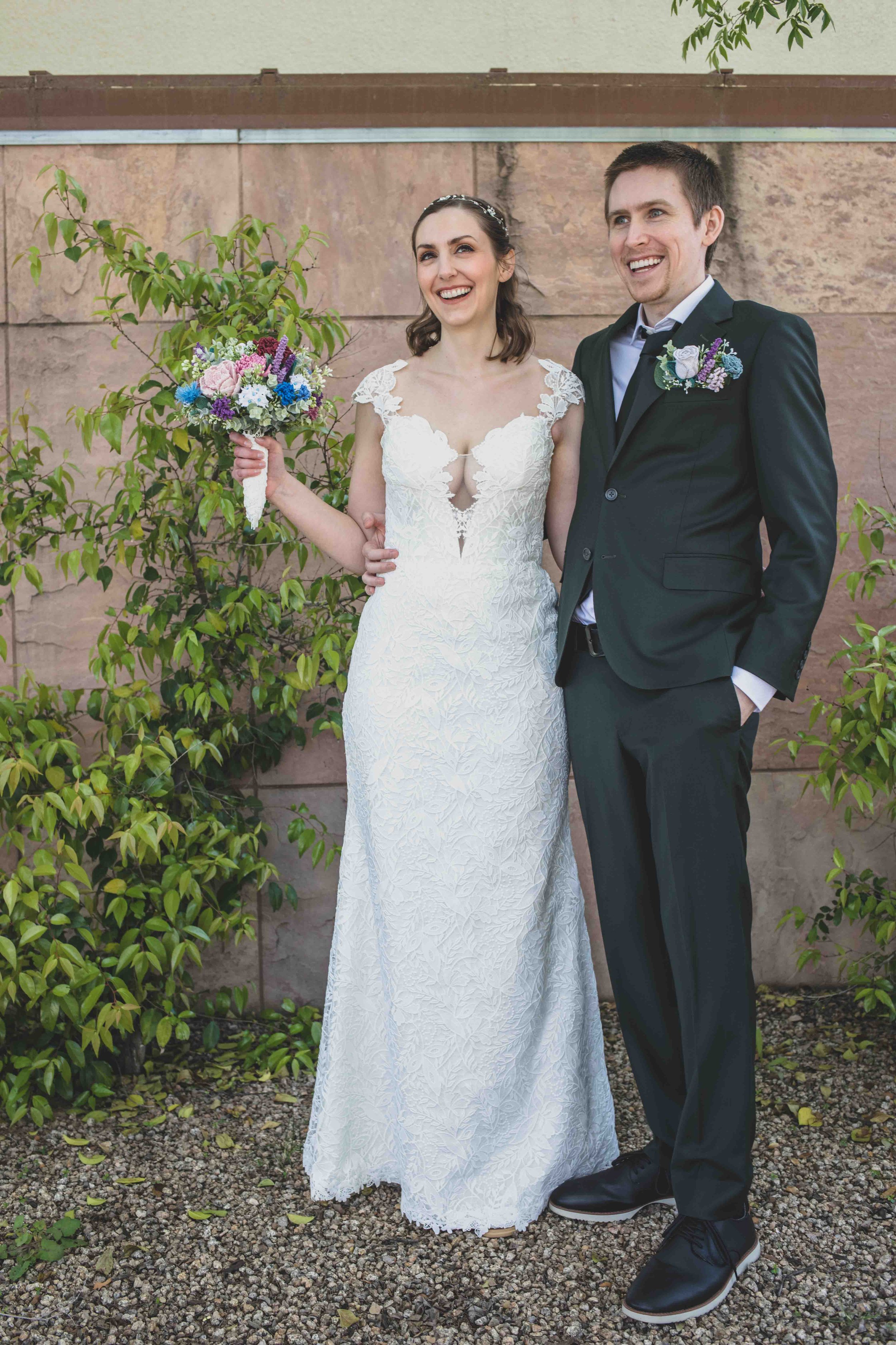 Bride and Groom pose for their wedding day by Chander, Arizona Wedding Photographer Jennifer Lind Schutsky.