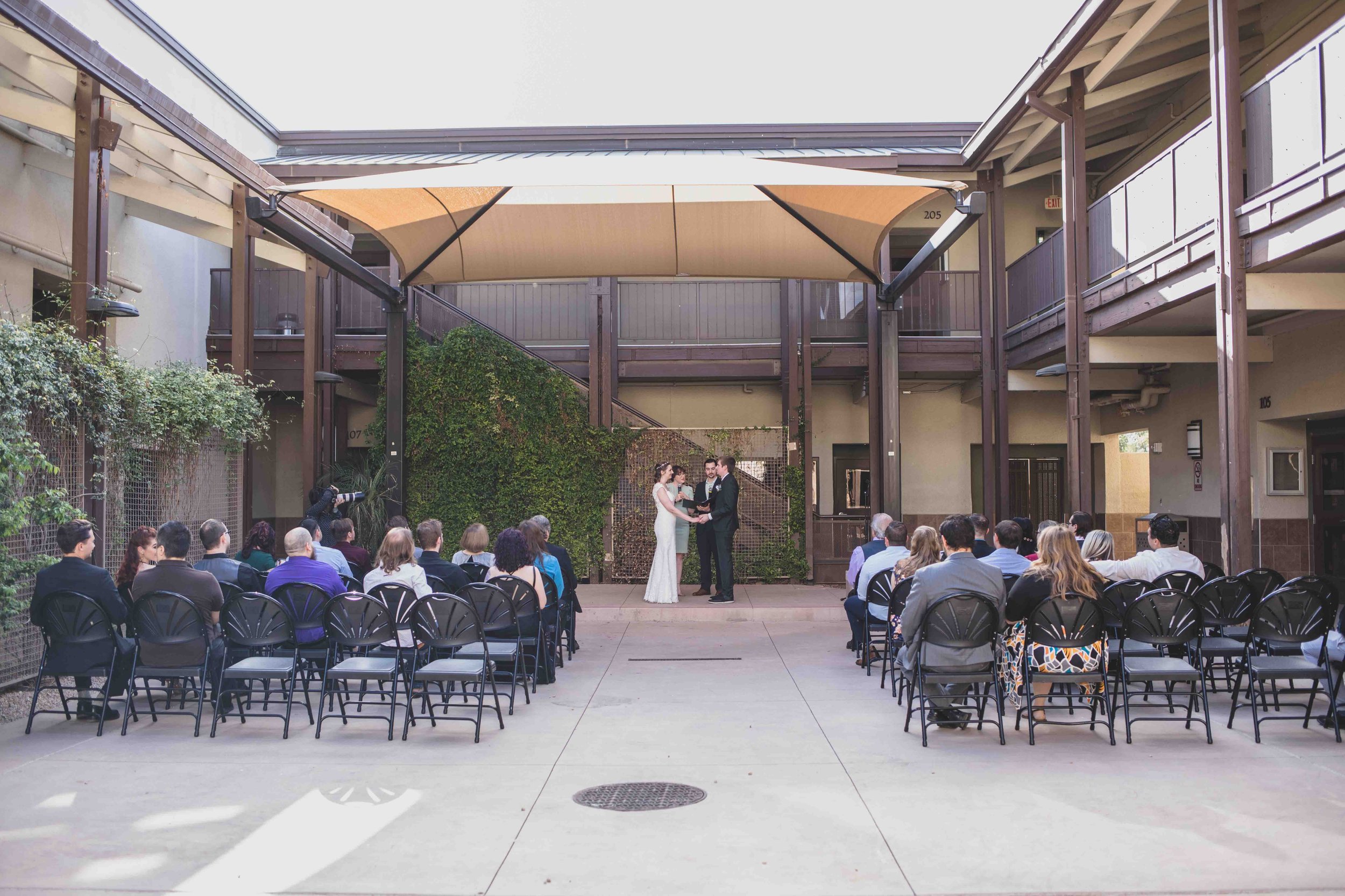Casual wedding ceremony at Gilbert Community Center by Gilbert, Arizona Wedding Photographer Jennifer Lind Schutsky.