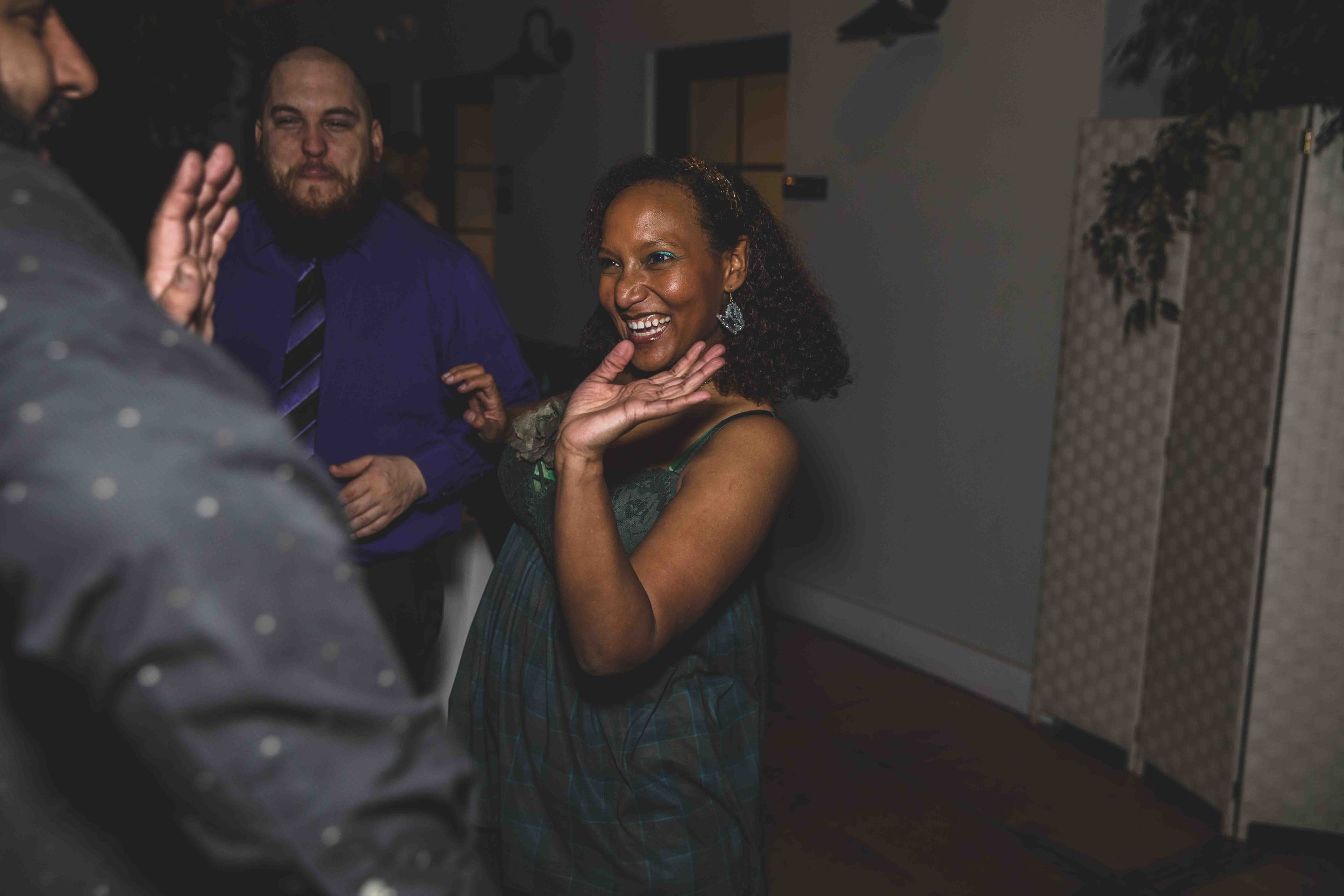 Guests dancing at the Wedding Reception at Hidden House by Gilbert, Arizona Wedding Photographer Jennifer Lind Schutsky.