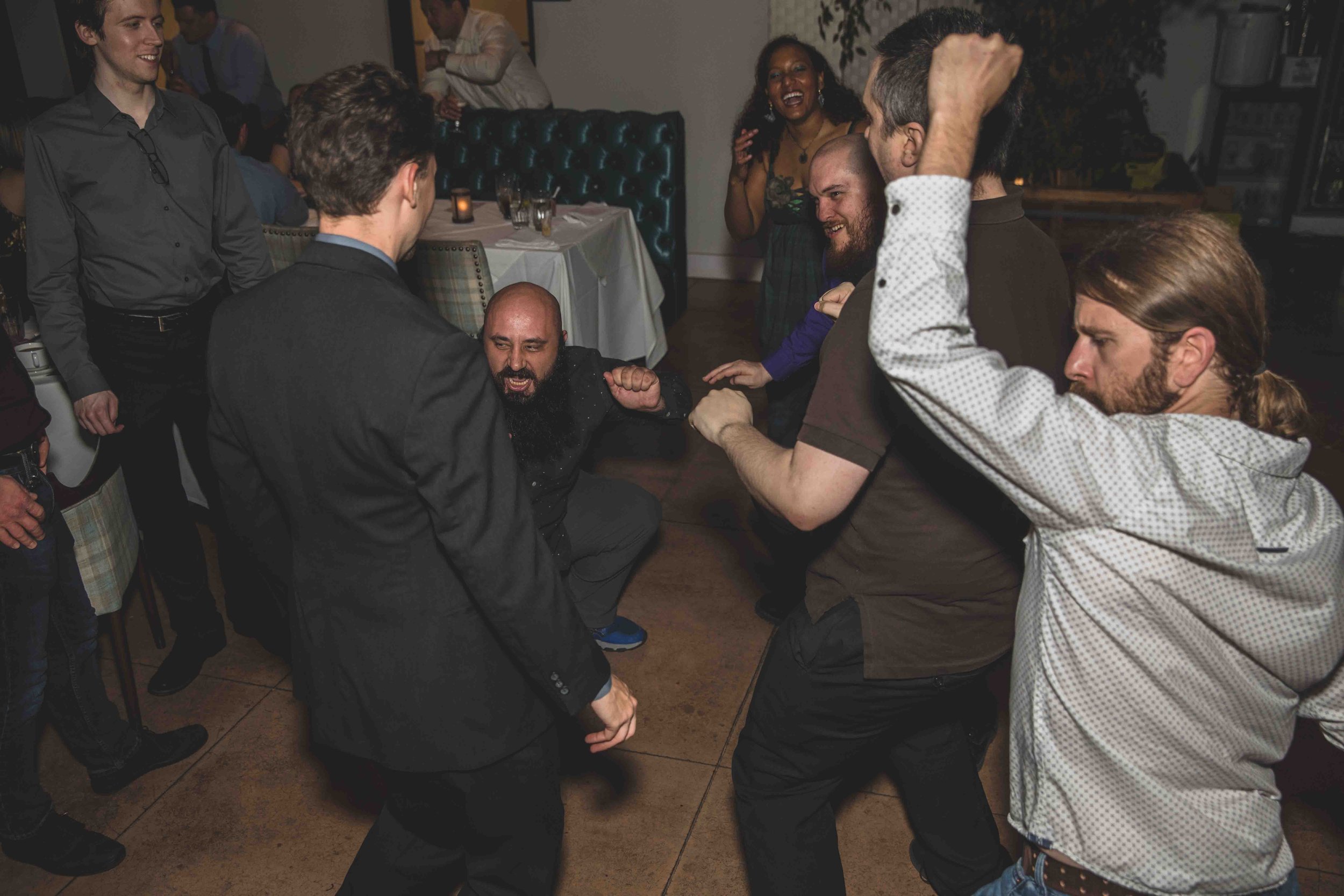Guests dancing at the Wedding Reception at Hidden House by Gilbert, Arizona Wedding Photographer Jennifer Lind Schutsky.