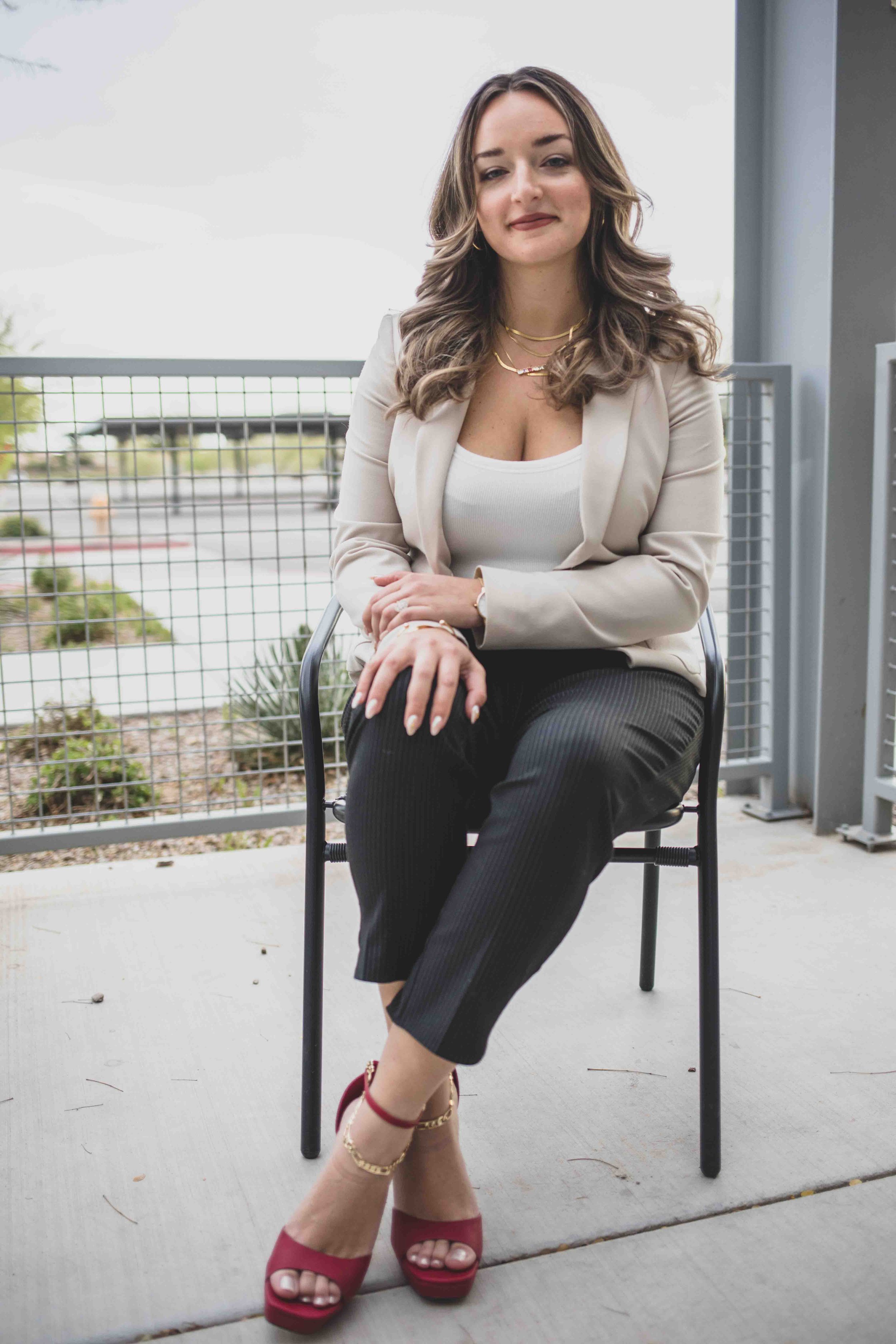 Naturopathic Doctor poses on a patio in front of office complex in Gilbert, Arizona by Gilbert Branding Photographer, Jennifer Lind Schutsky.